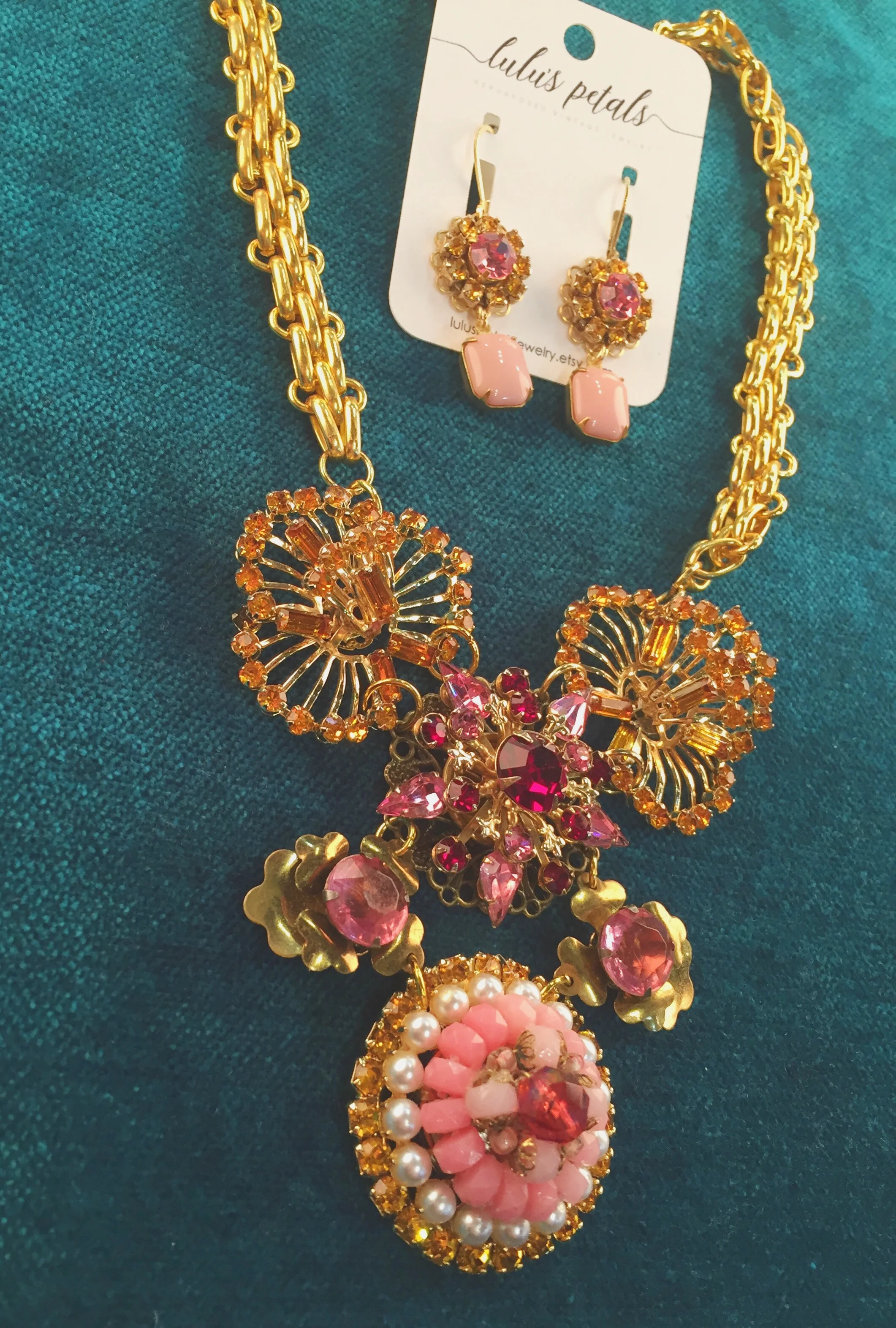 Necklace, $98; earrings, $34