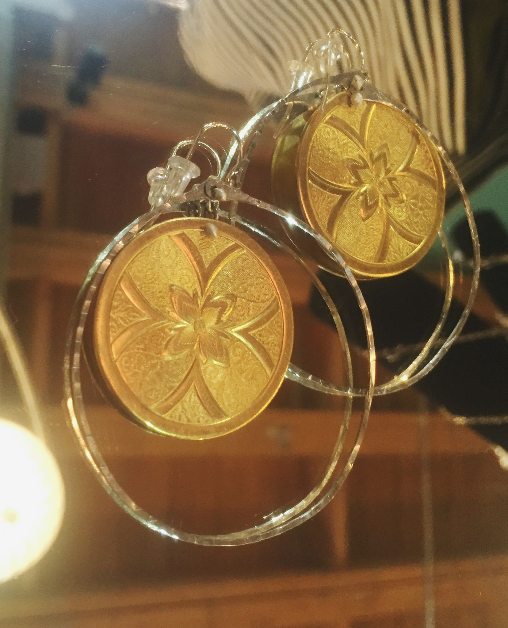 Gold and silver hoops, $48