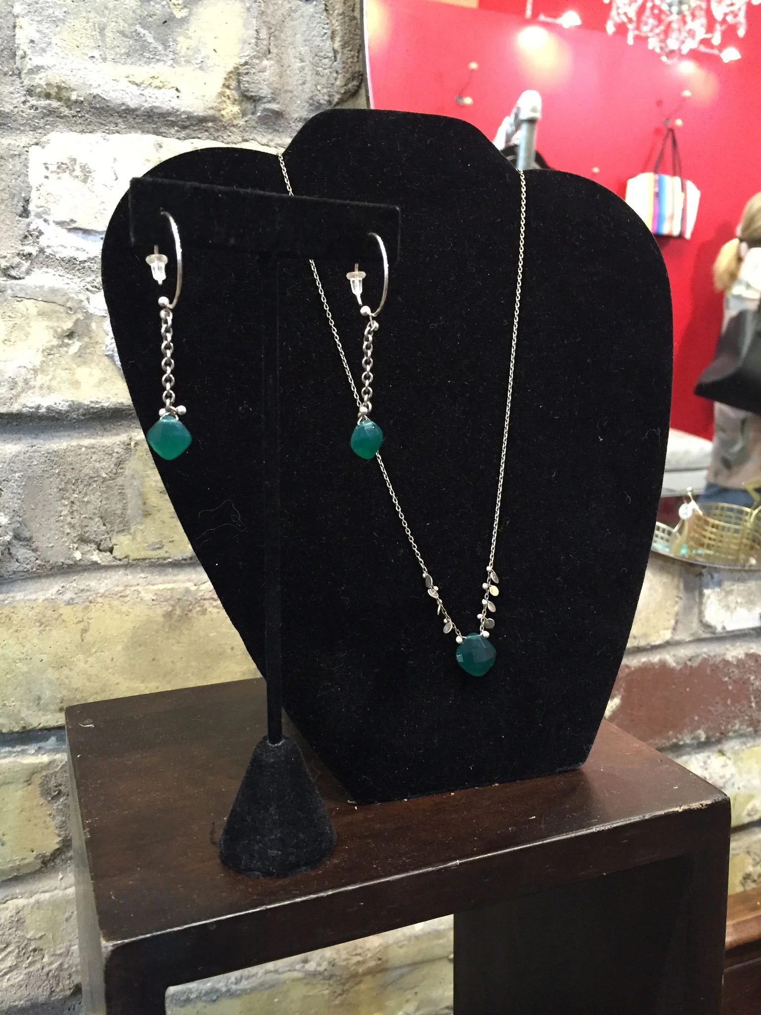 Green onyx necklace, $72; earrings, $48