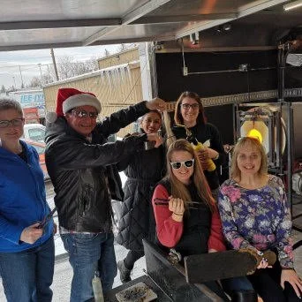 co workers Christmas party Glass blowing Event.jpg