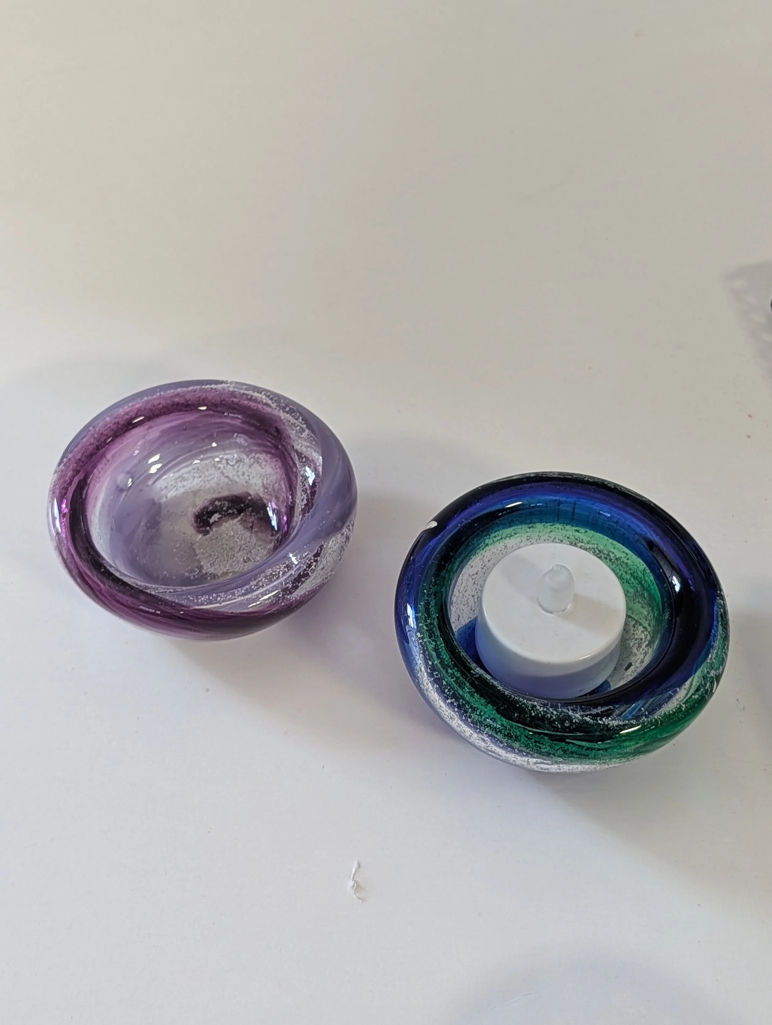 ashes in glass art candle holders.jpg