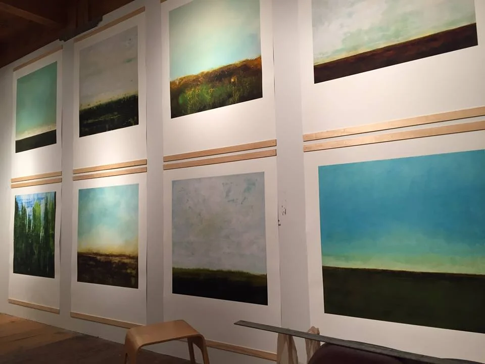 prints on studio wall.jpg