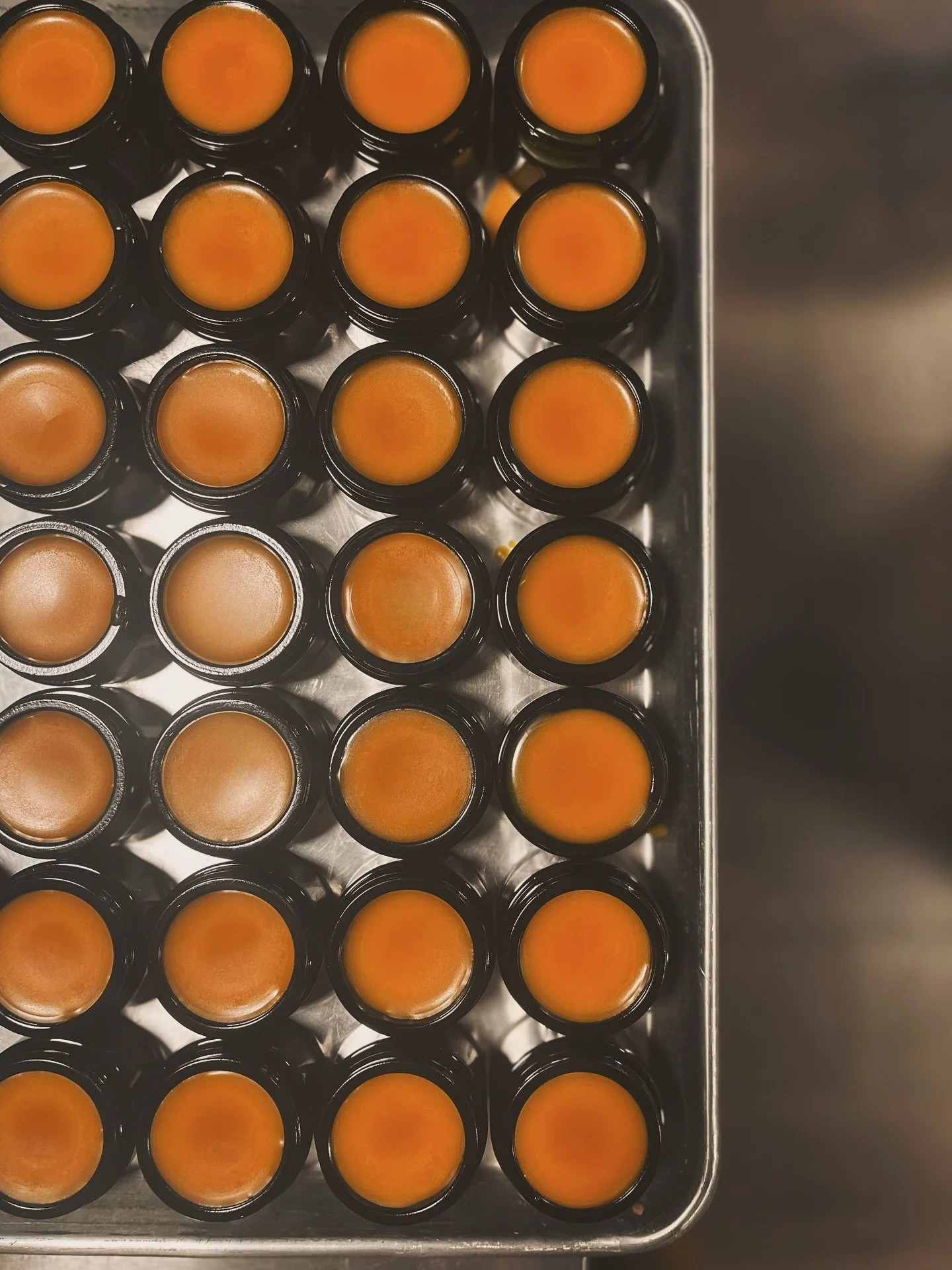 Fresh pour for today. Toggle between slides for the action. 🧡

This is SunRoot Solid Serum, our jammy balm utilizing local maple blossom honey. Harmonizes best with skin that has experienced hyperpigmentation &amp; sun damage, but of course fit for 