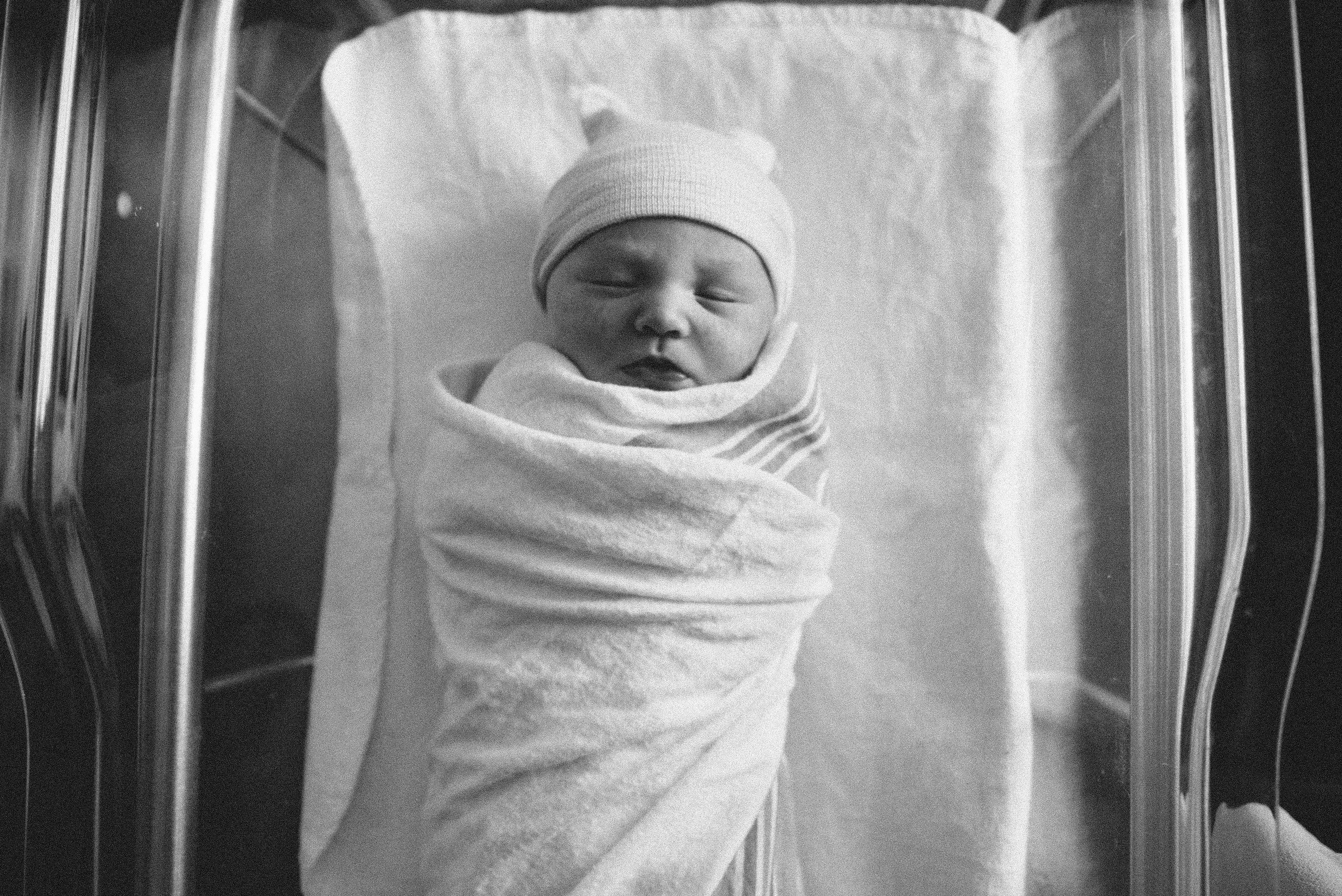 swaddled baby-pensacola child photographer