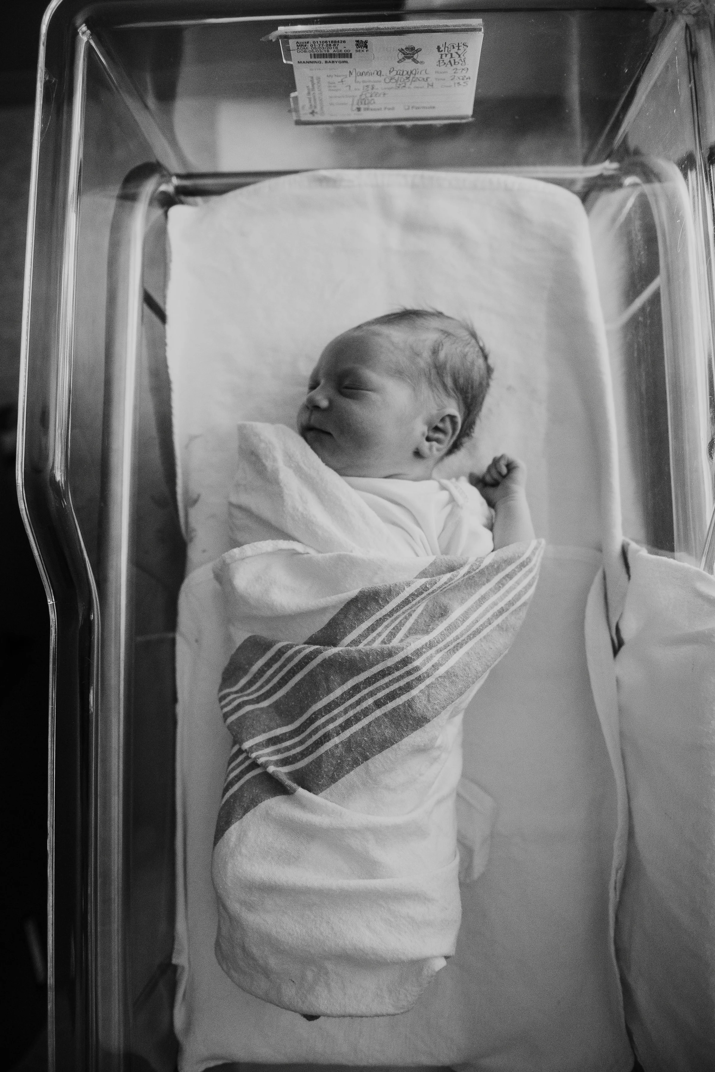 baby in crib-pensacola newborn photographer