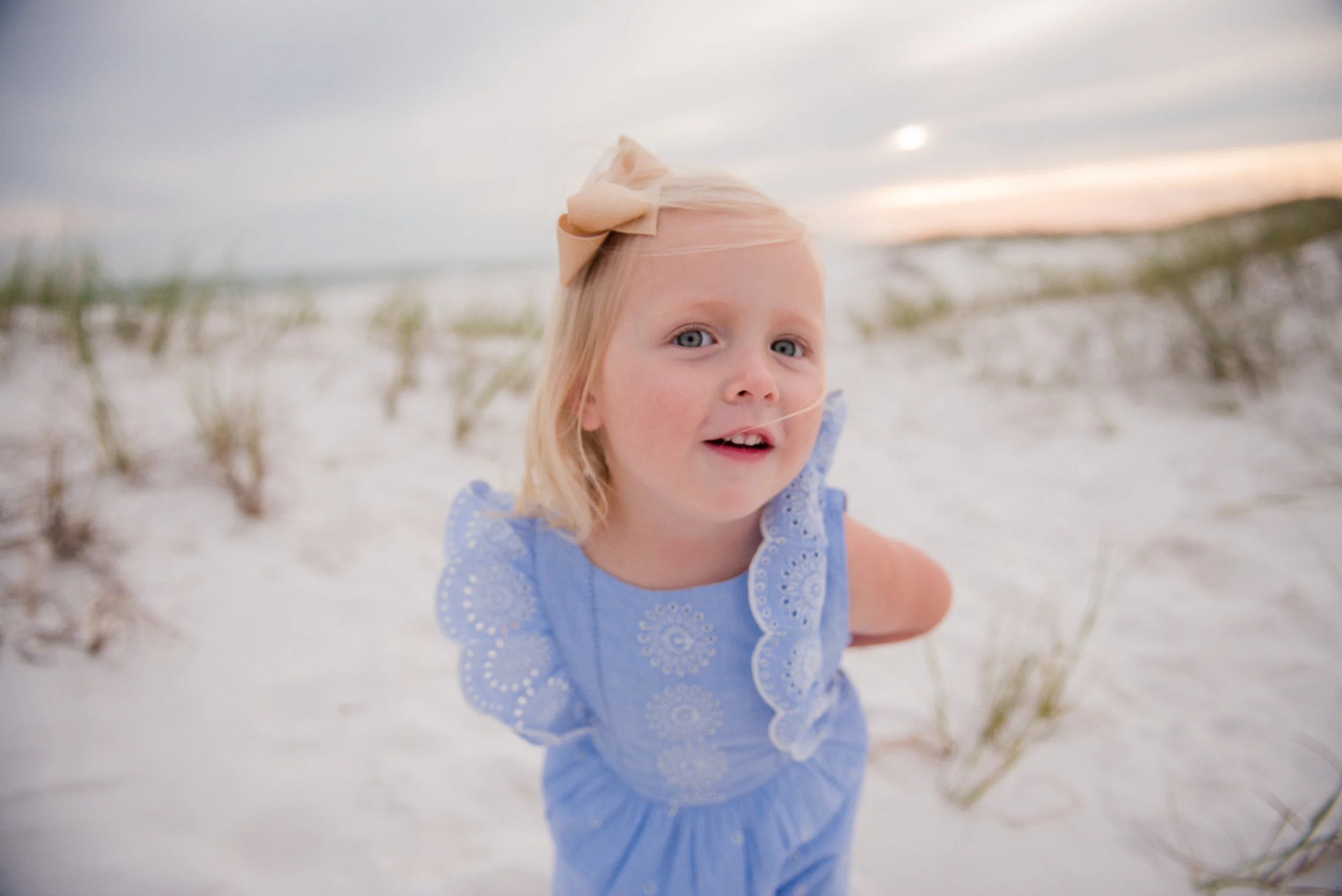 girl in dune-pensacola beach family photographer