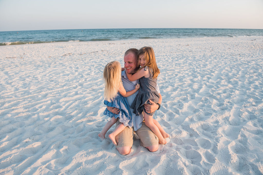 dad with girls on beach- Navarre Beach Photographer