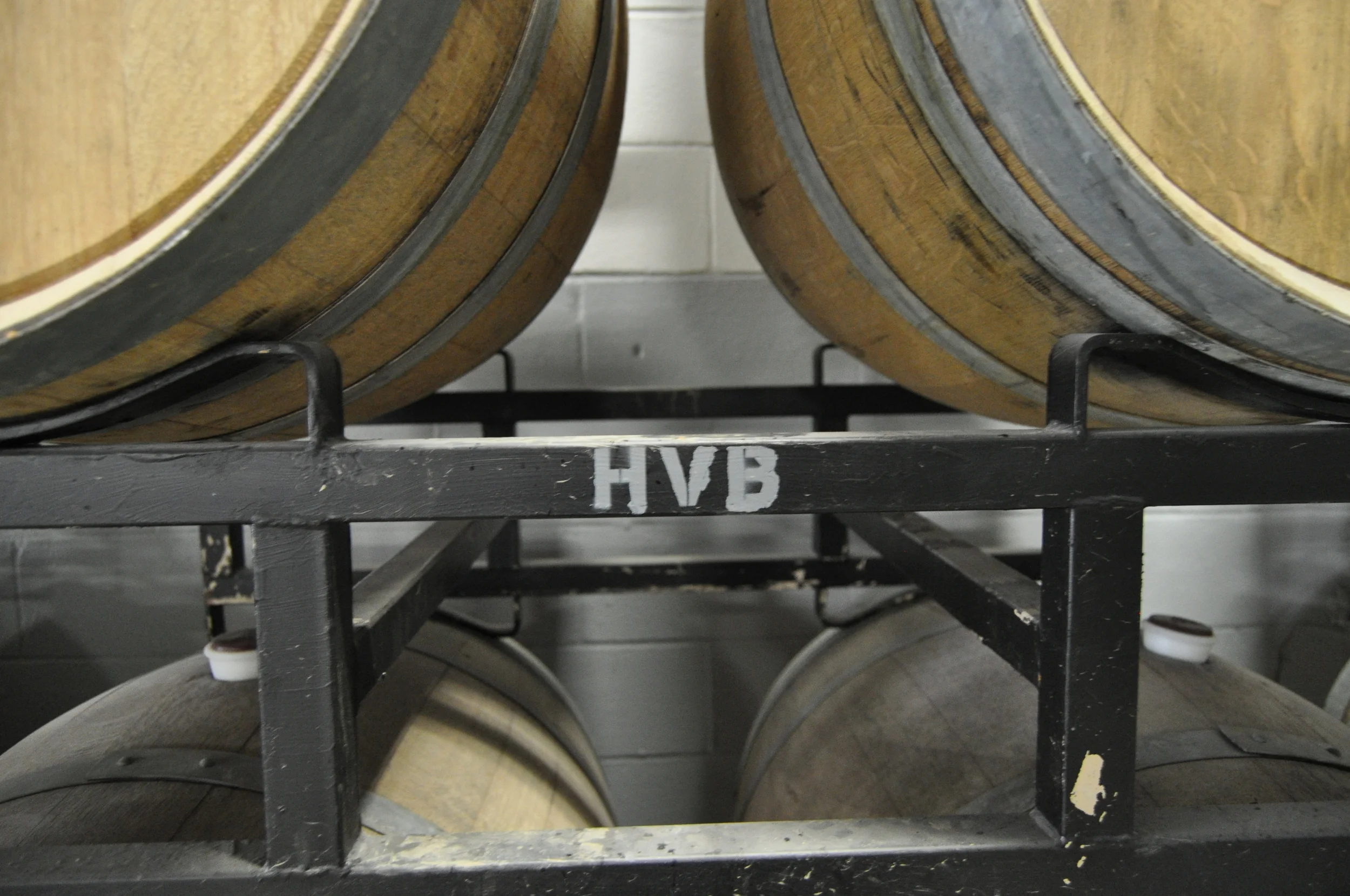 Some of our barrels in front of the freshly painted wall