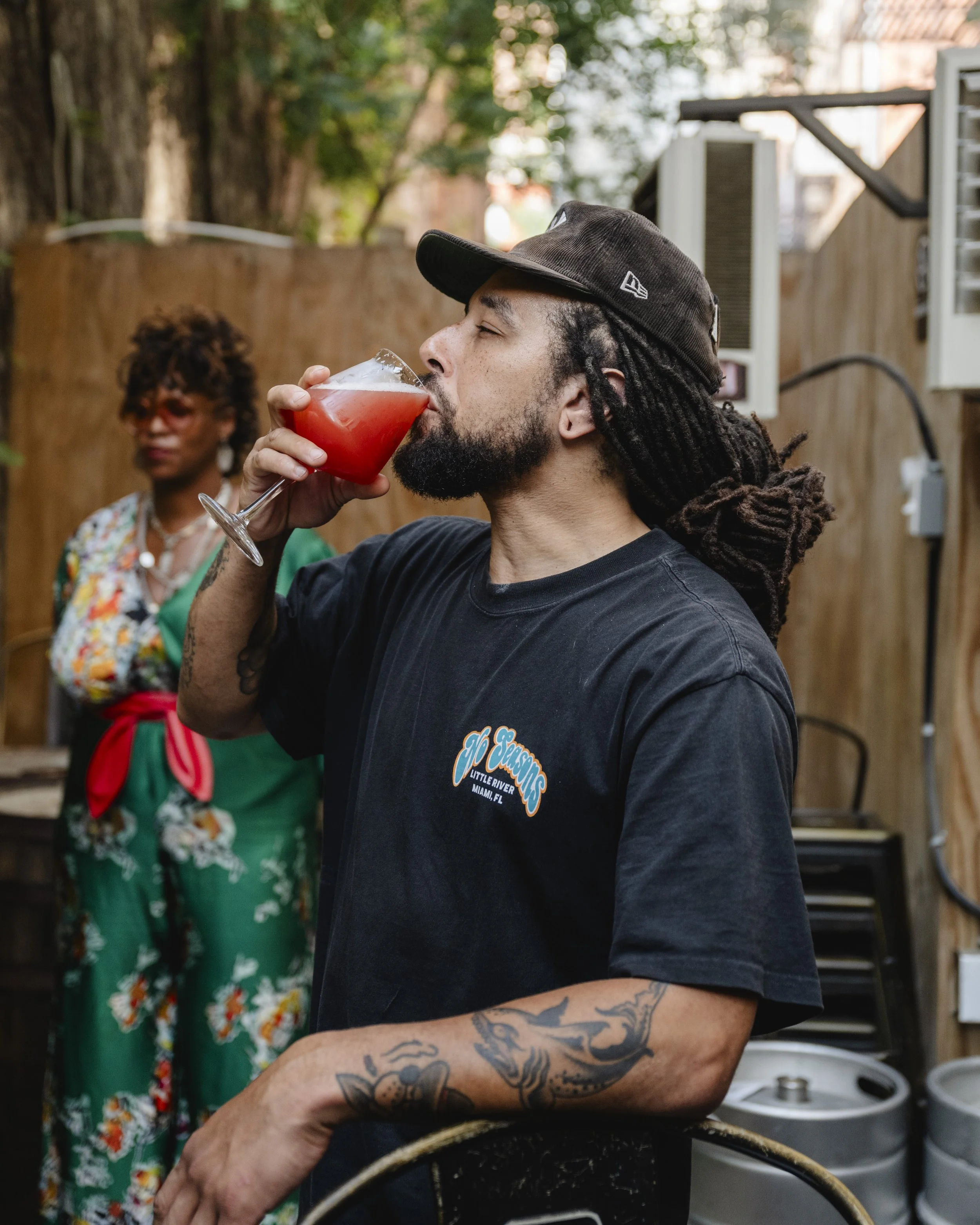 Jamal taking a big ole sip of some tasty Sour IPA.