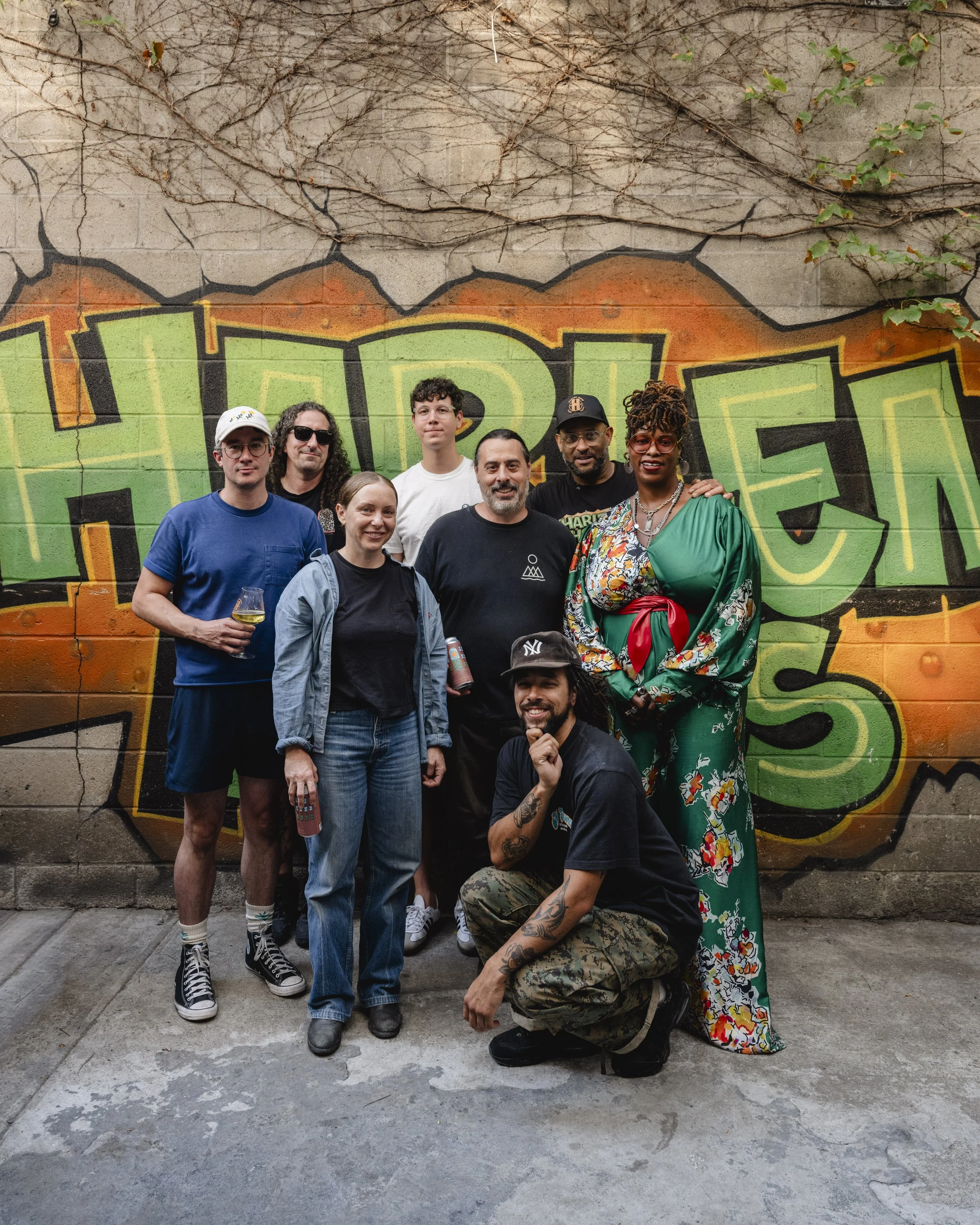 The HVB and Harlem Hops team pictured in the backyard of Harlem Hops.