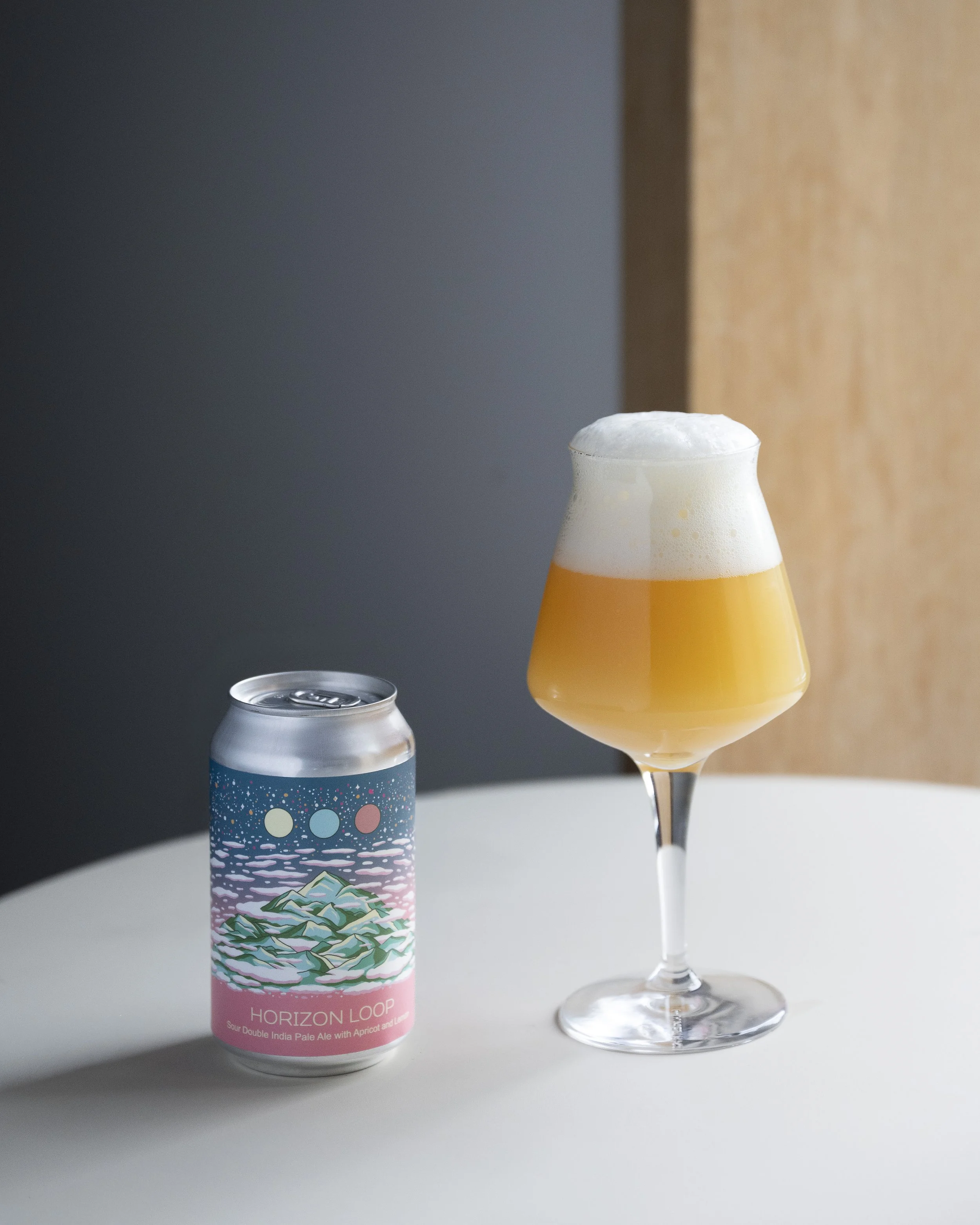Horizon Loop Sour IPA in can and glass