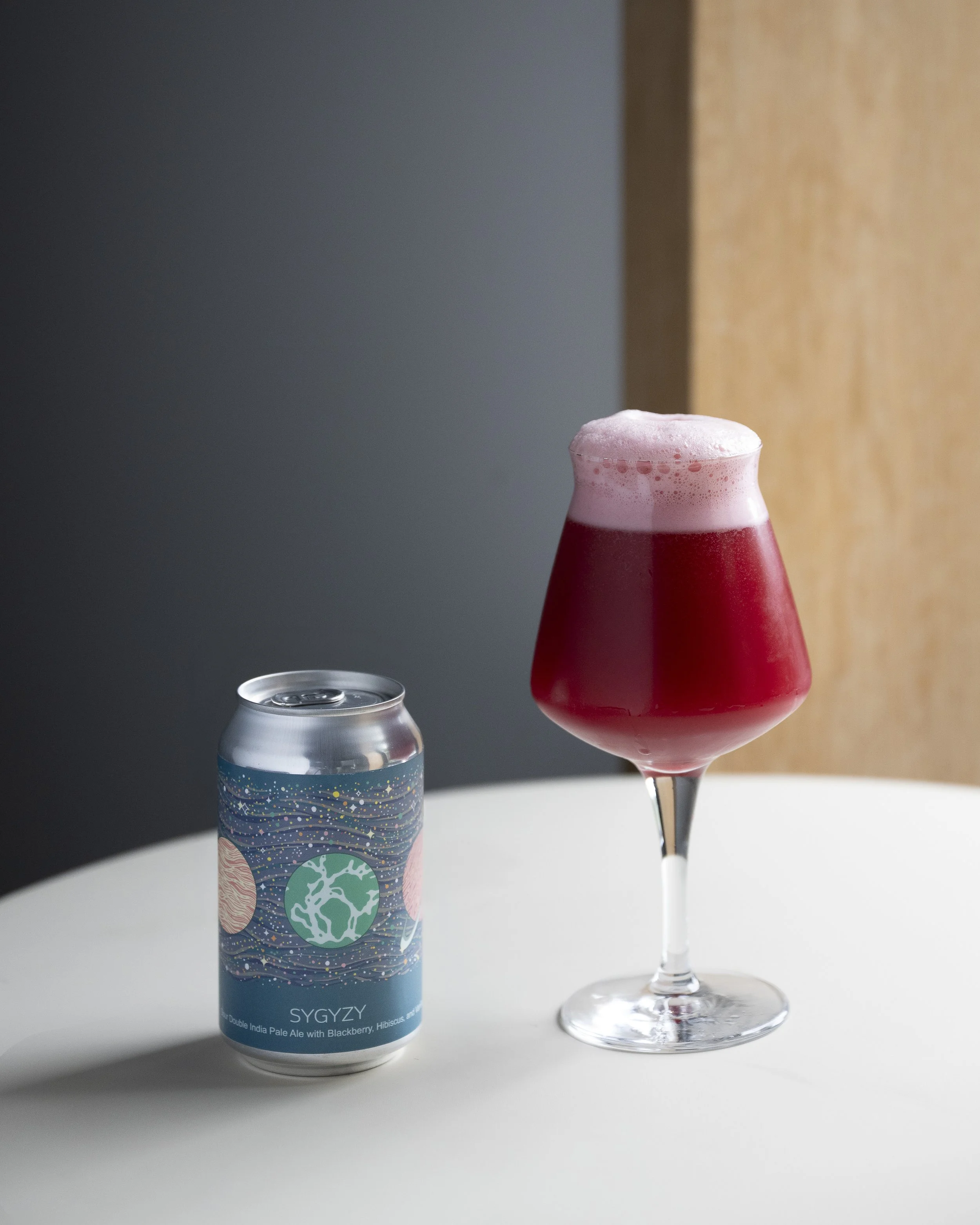 Syzygy Sour IPA in can and glass