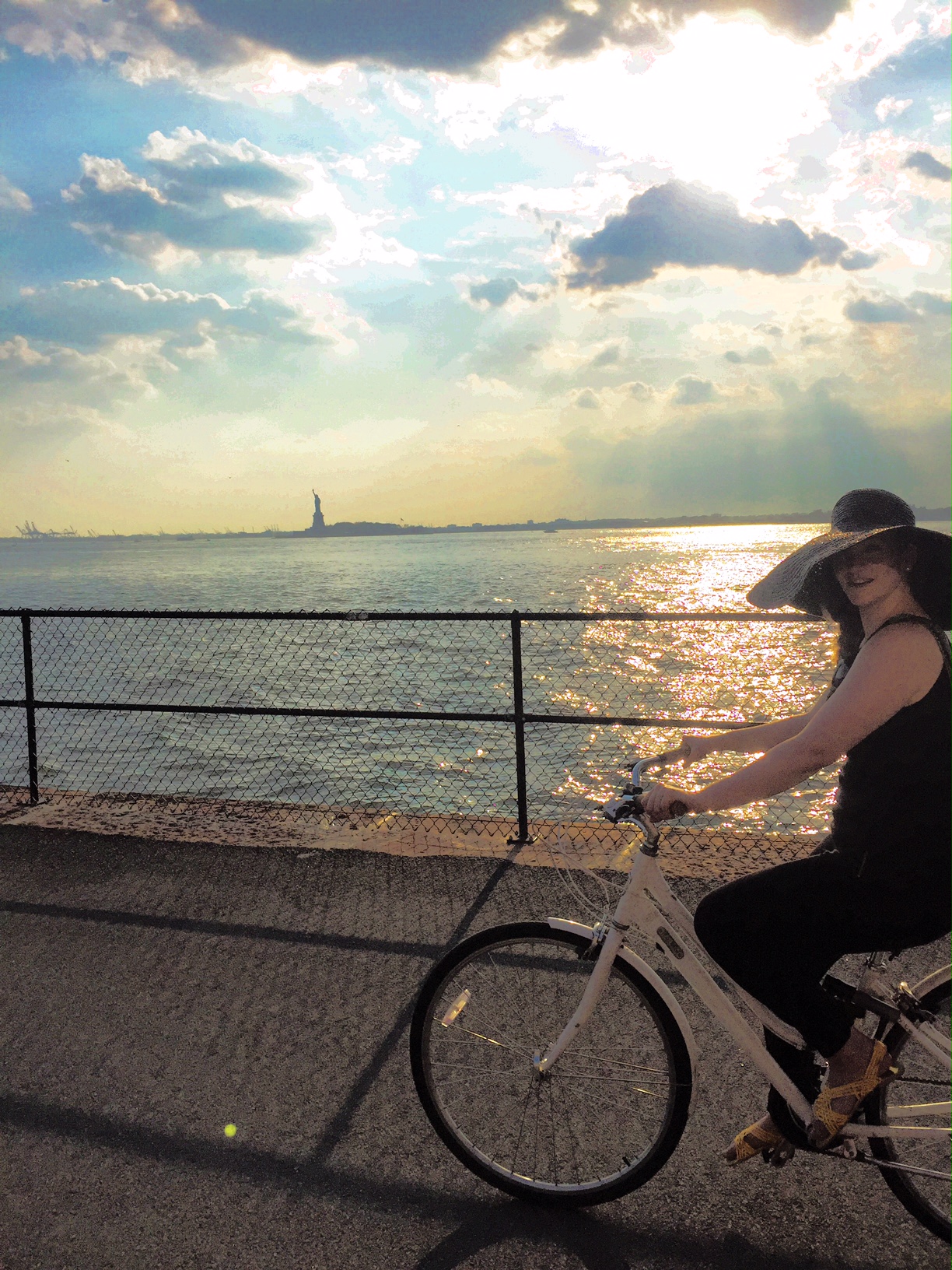 Casually cruisin' past old lady Liberty