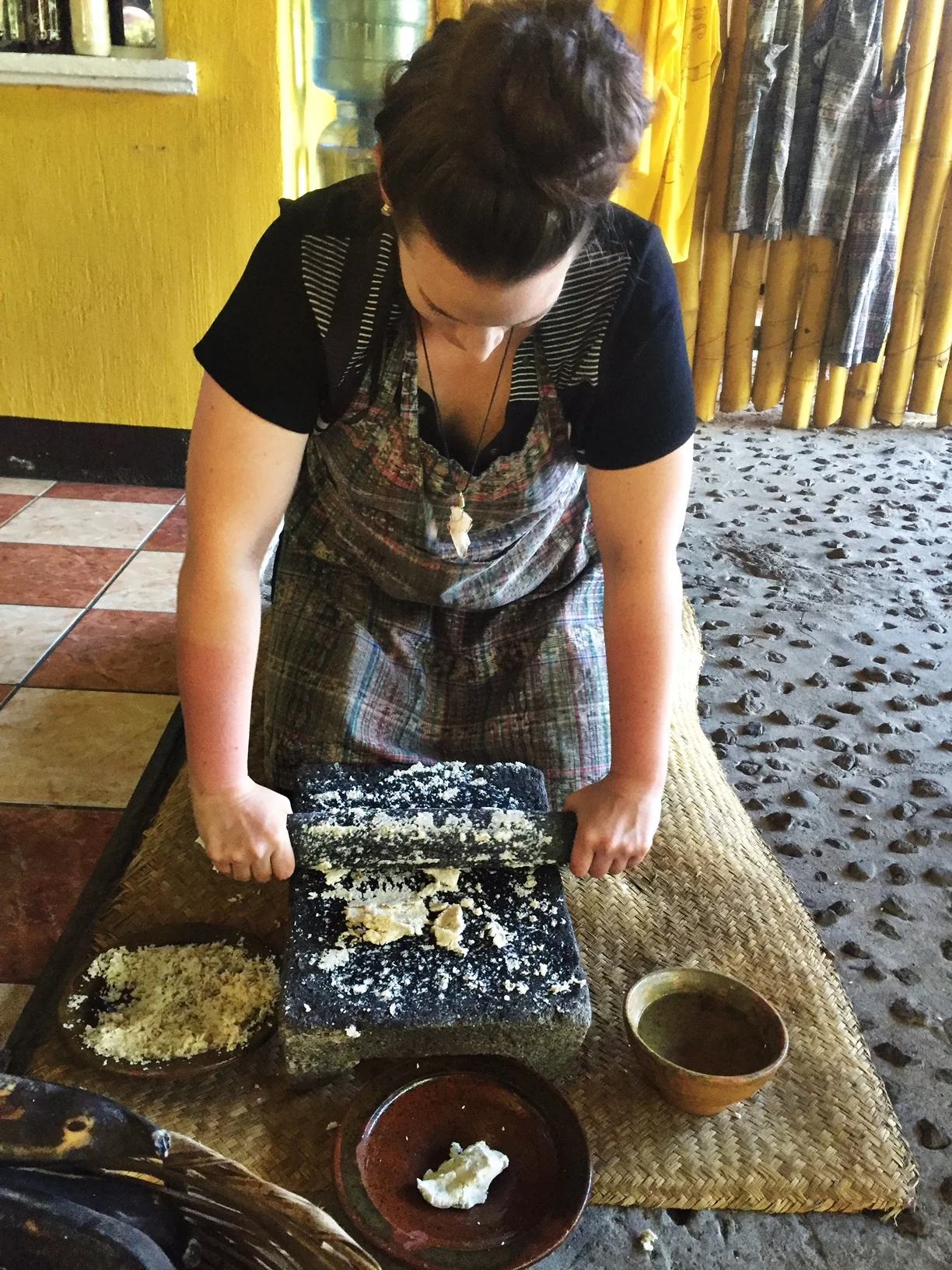 Grinding the corn for tortillas