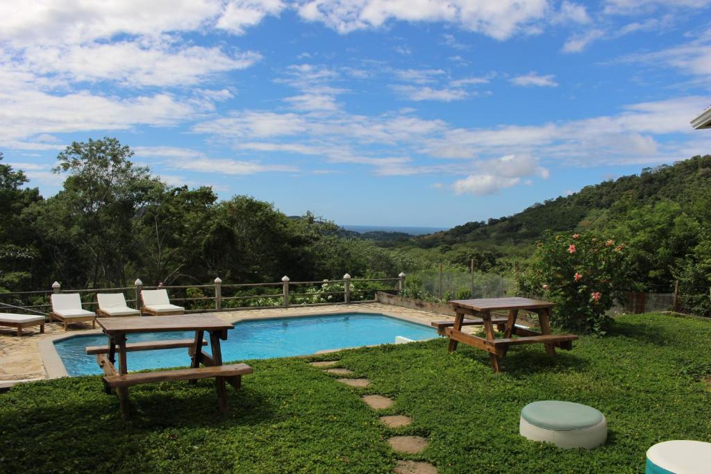 coconut-surf-camp-nicaragua-villa-backyard-pool.jpg