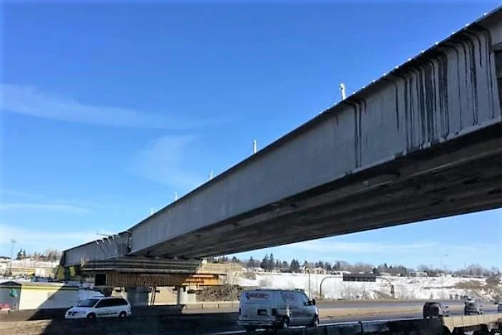 The girders have been installed and the new bridge spanning the Western Headworks Canal and Deerfoot Trail are taking shape! (Source: 17 Avenue SE BRT team)