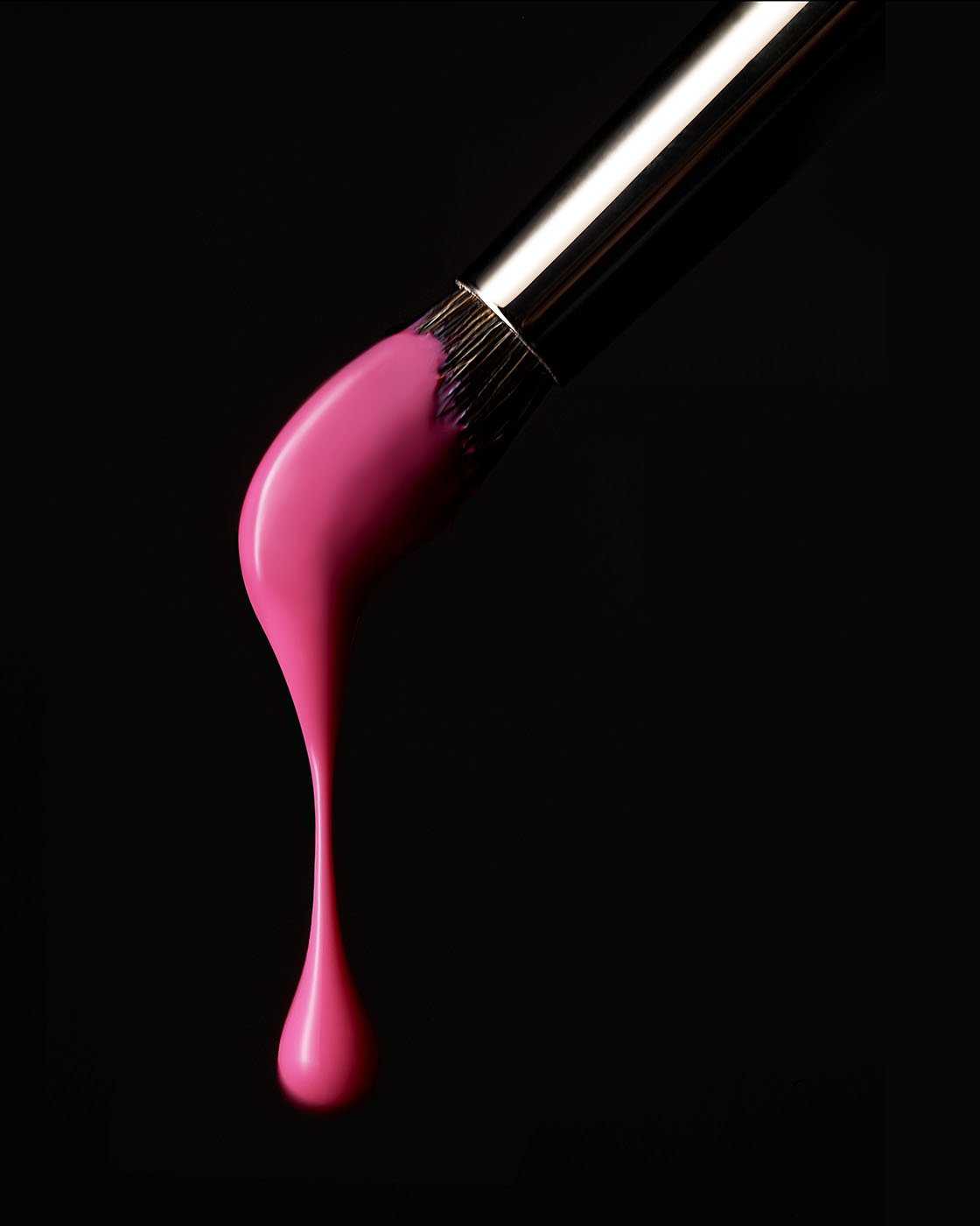 Pink Nail varnish on a brush