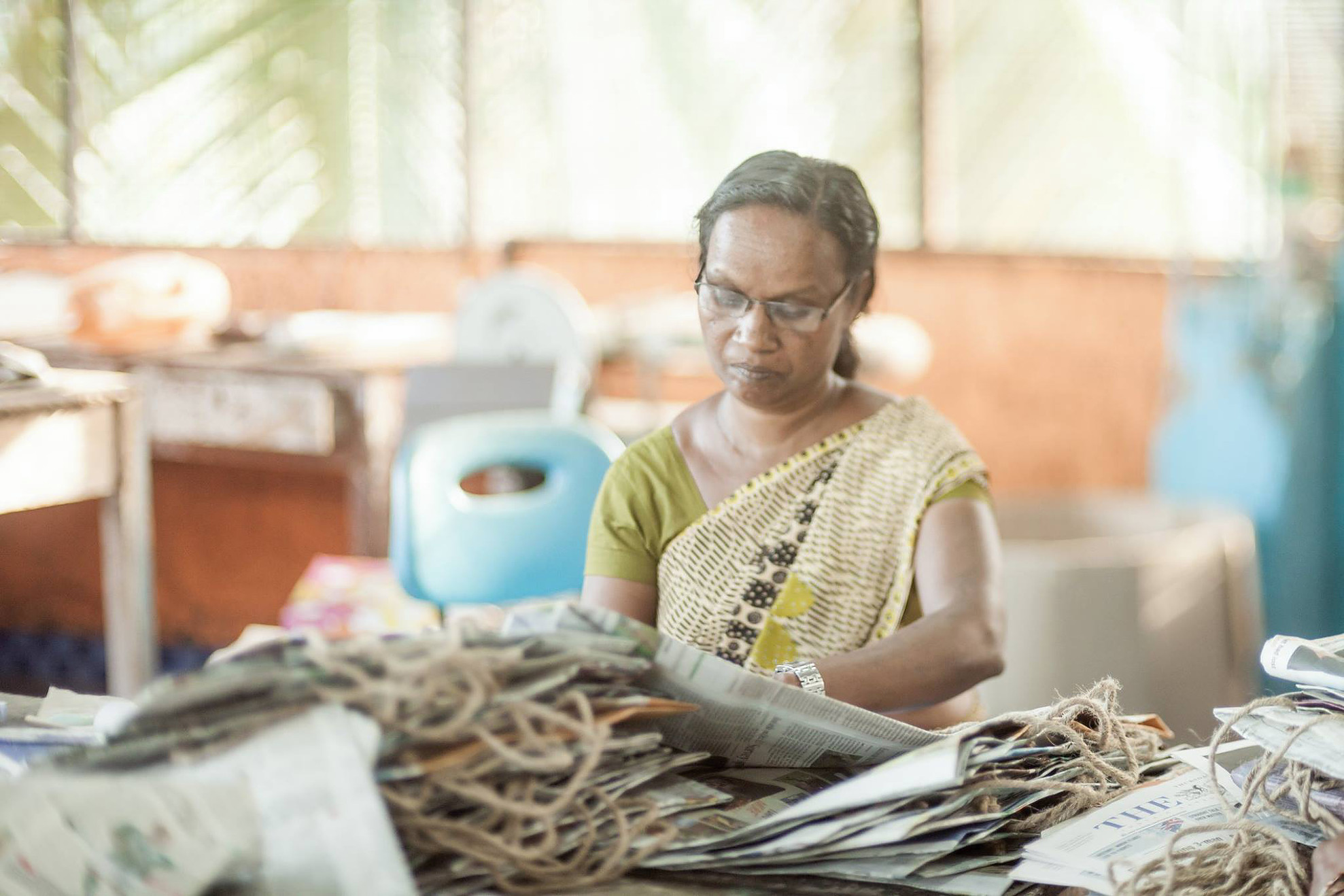 A local woman making recycled fair-trade bags. One of the many social employment programs that SISP has successfully implemented.
