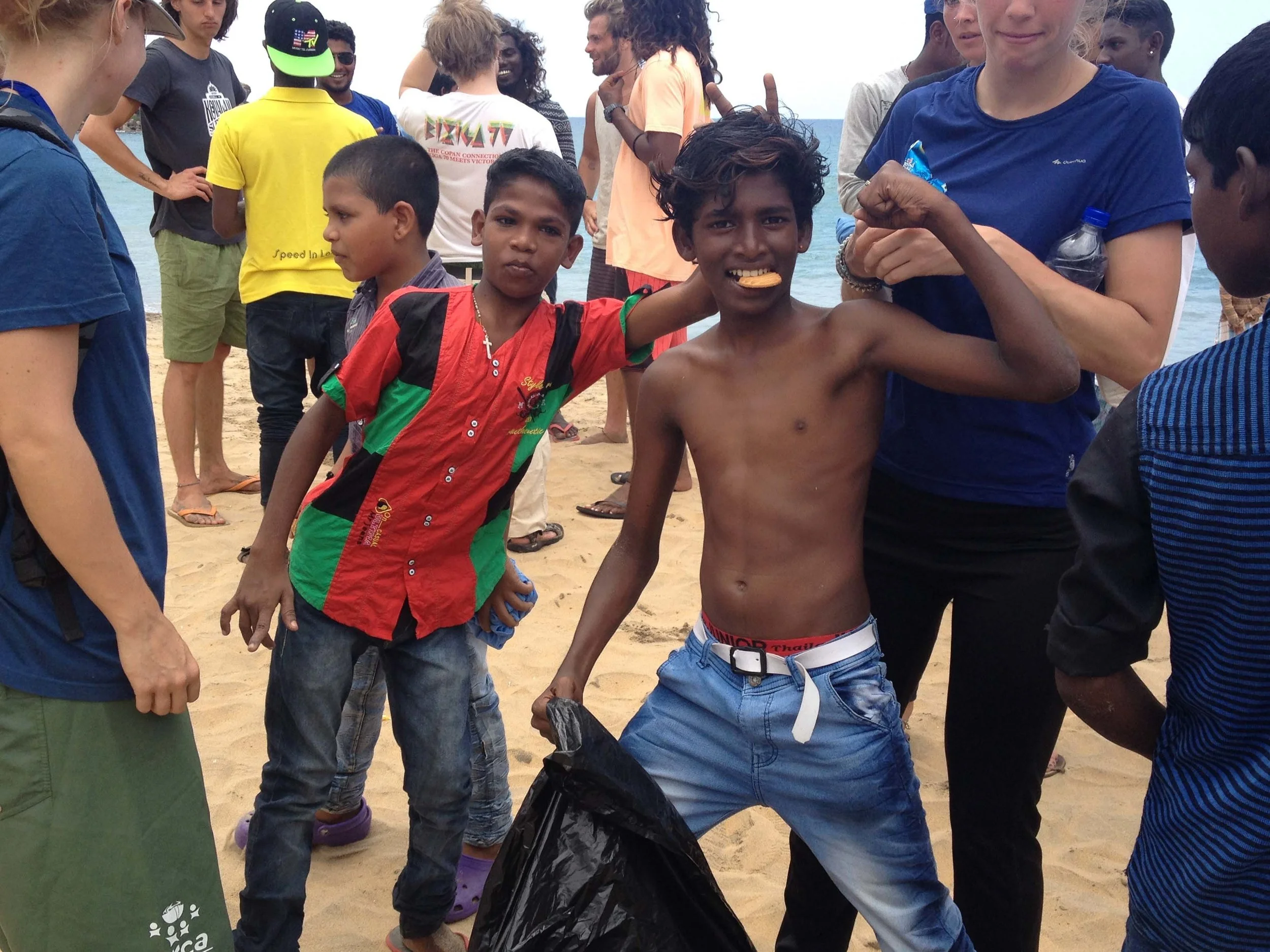 Some of the SISP kids from Vizhinjam assisting us with a local beach clean-up.
