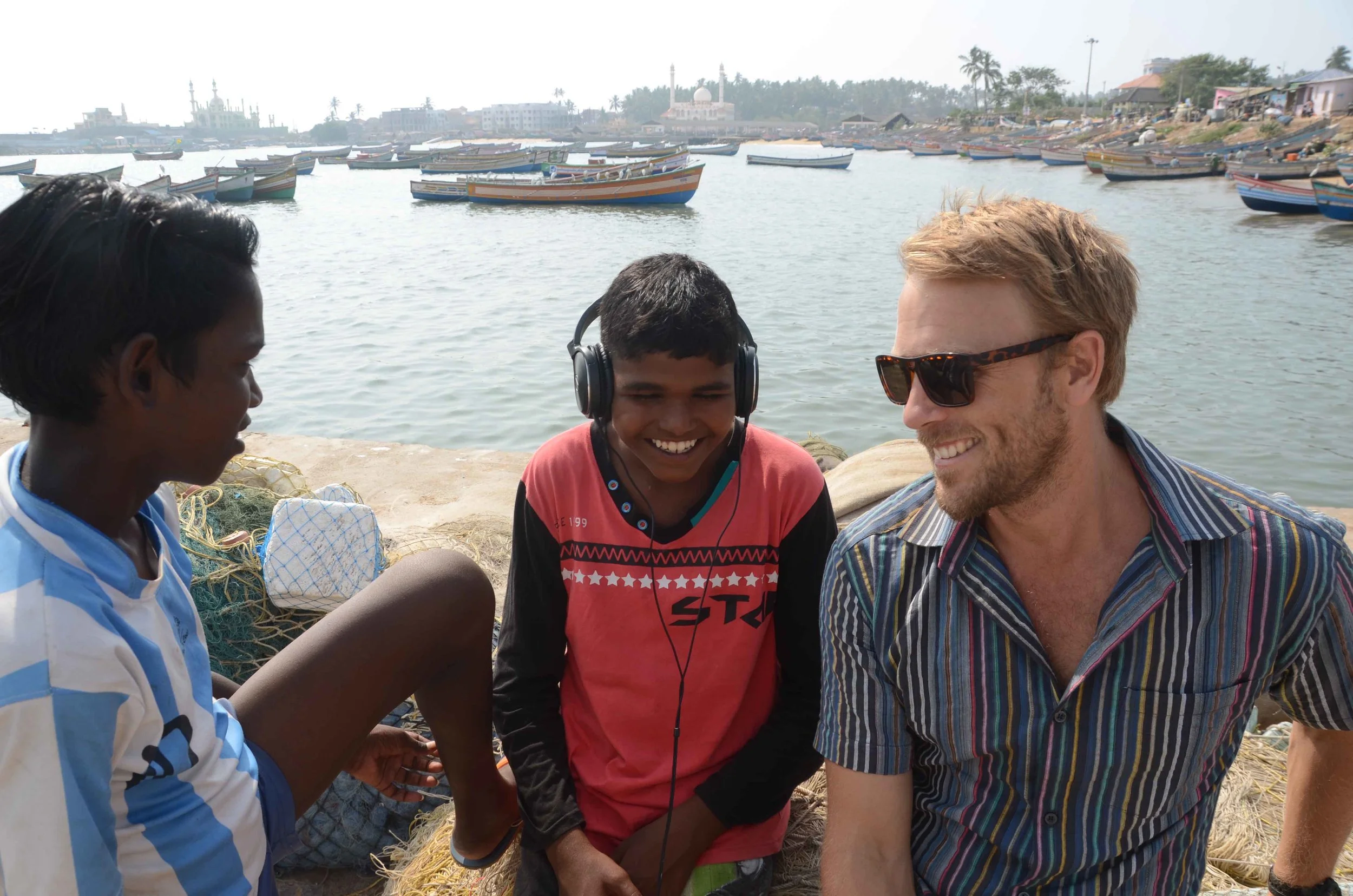 Cassidy from the fisheries team and the SISP kids having fun filming on the weekend in their hometown of Vizhinjam.