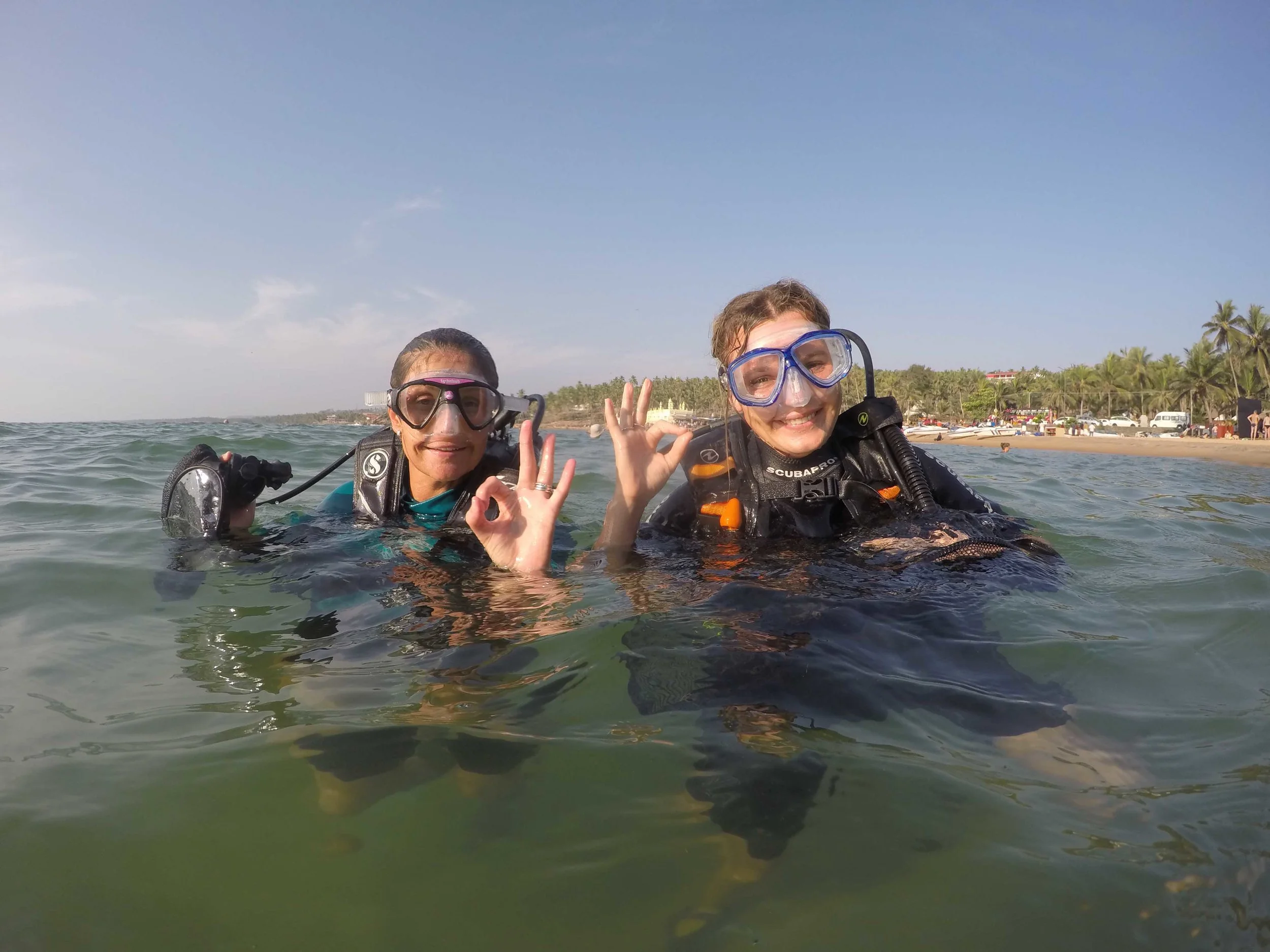 Sarah (left) and I assisting with an underwater clean-up, alongside our partners Bond Safari.