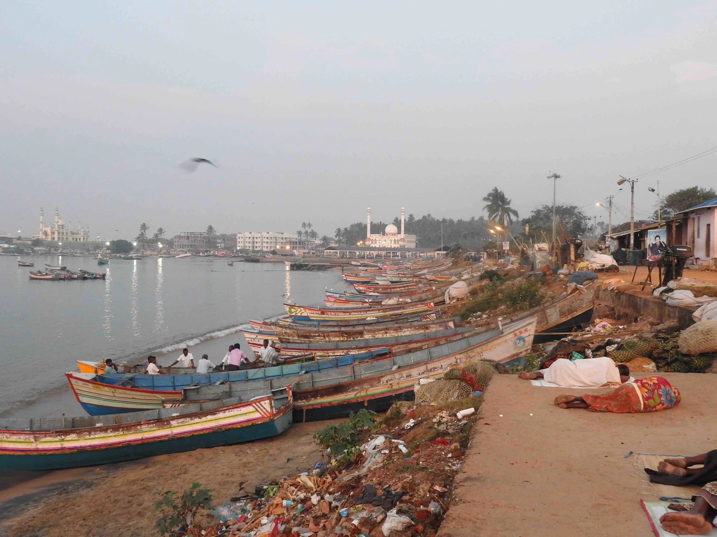 A surreal scene - sunrise over Vizhinham Harbour.