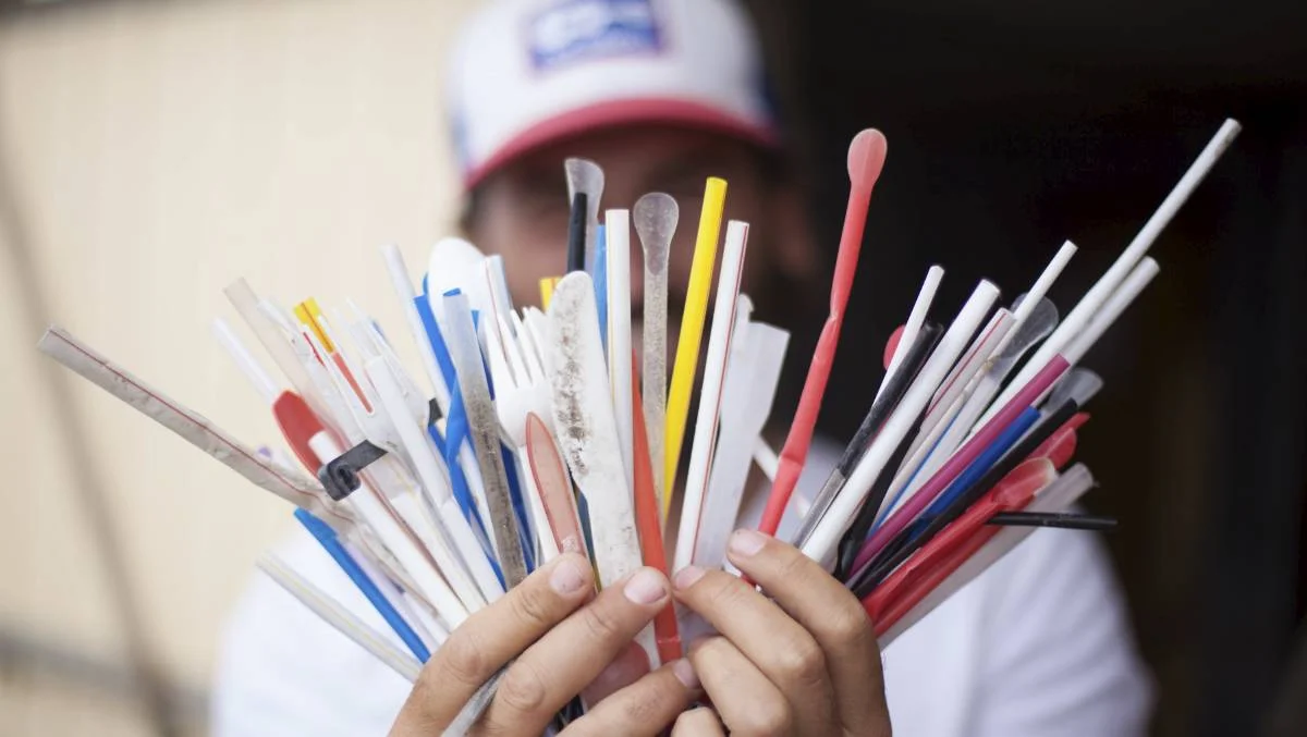plastic straws on beach