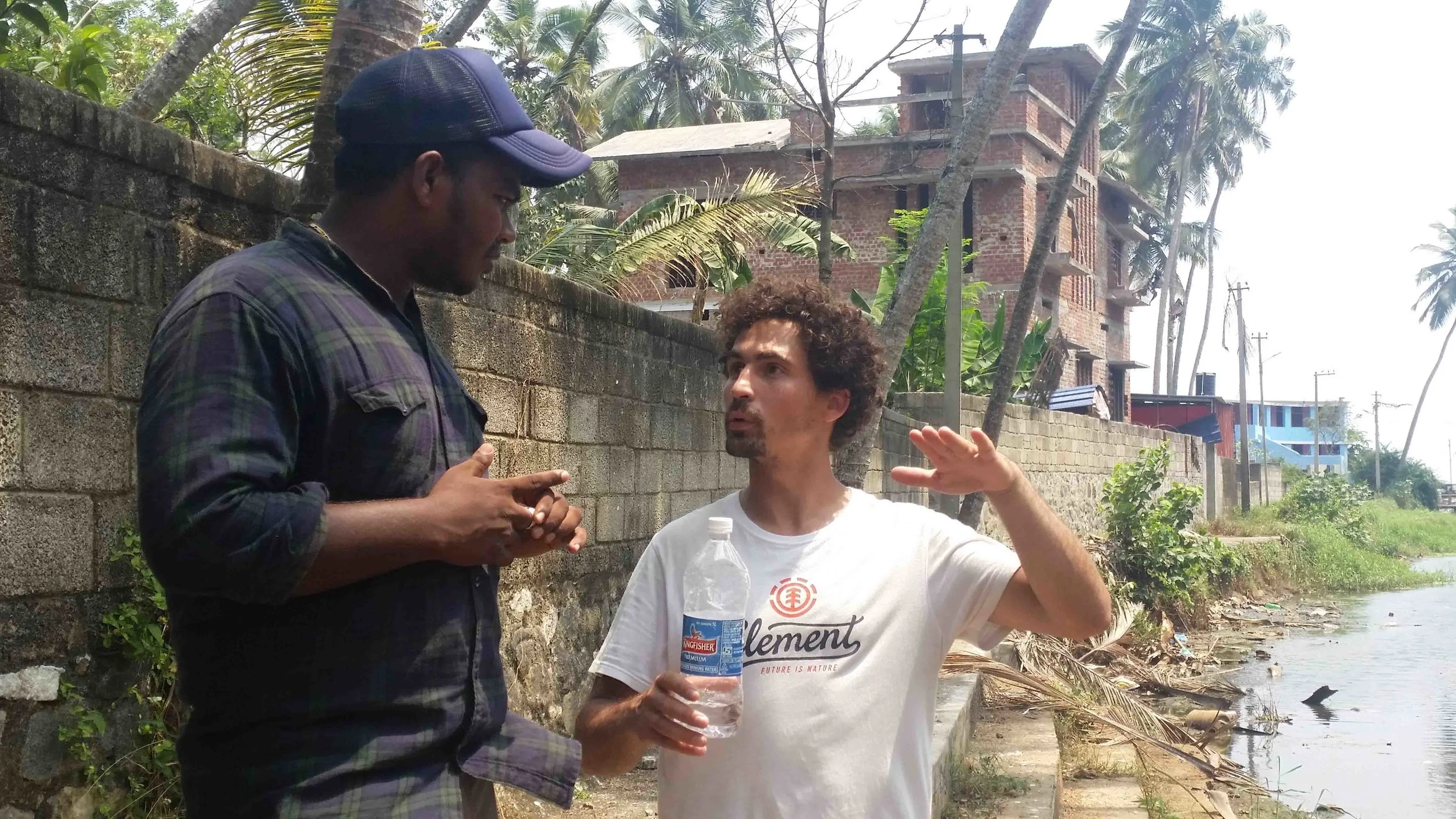 Discussing the situation with our local friend from Vizhinjam, James.