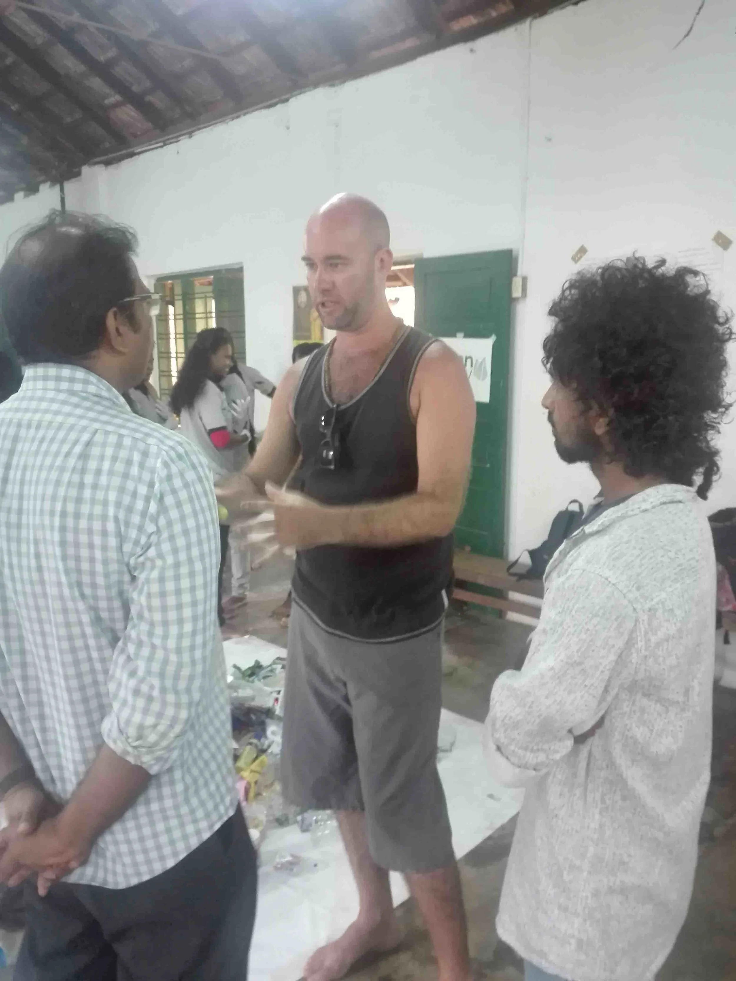 Blake and Krishna (our Global Program Coordinators) meeting with representatives from the Green Army.