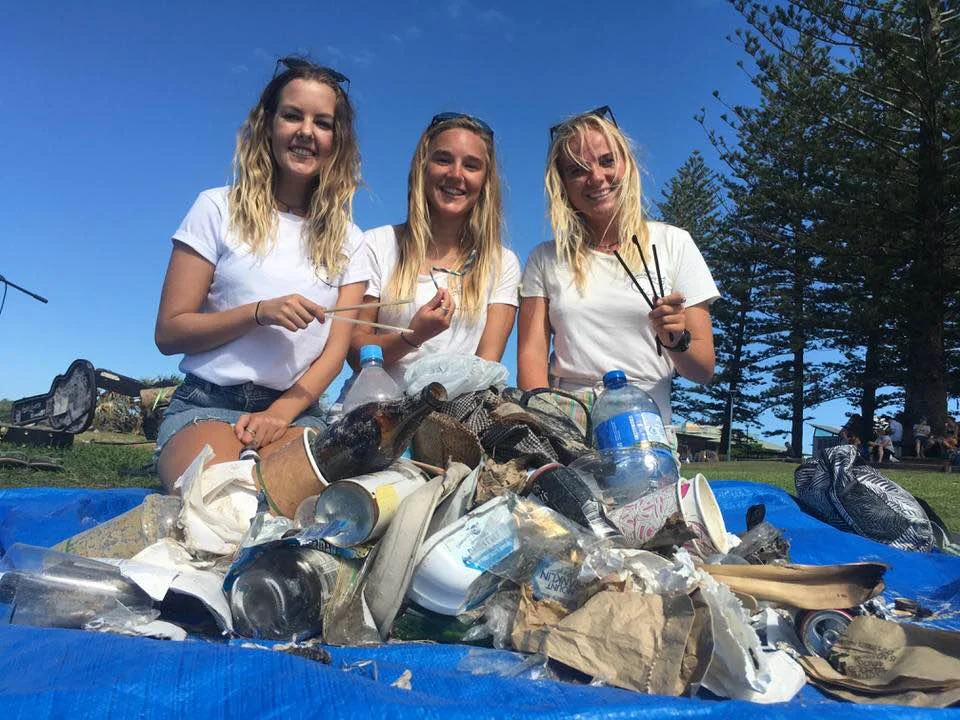 From left to right - Tara Elliott (Events Coordinator), Zoe White (Byron Bay Coordinator) and Louisa Andersen (Activ8 for the Ocean Education Programs Coordinator) sorting through a haul at Main Beach in Byron Bay.