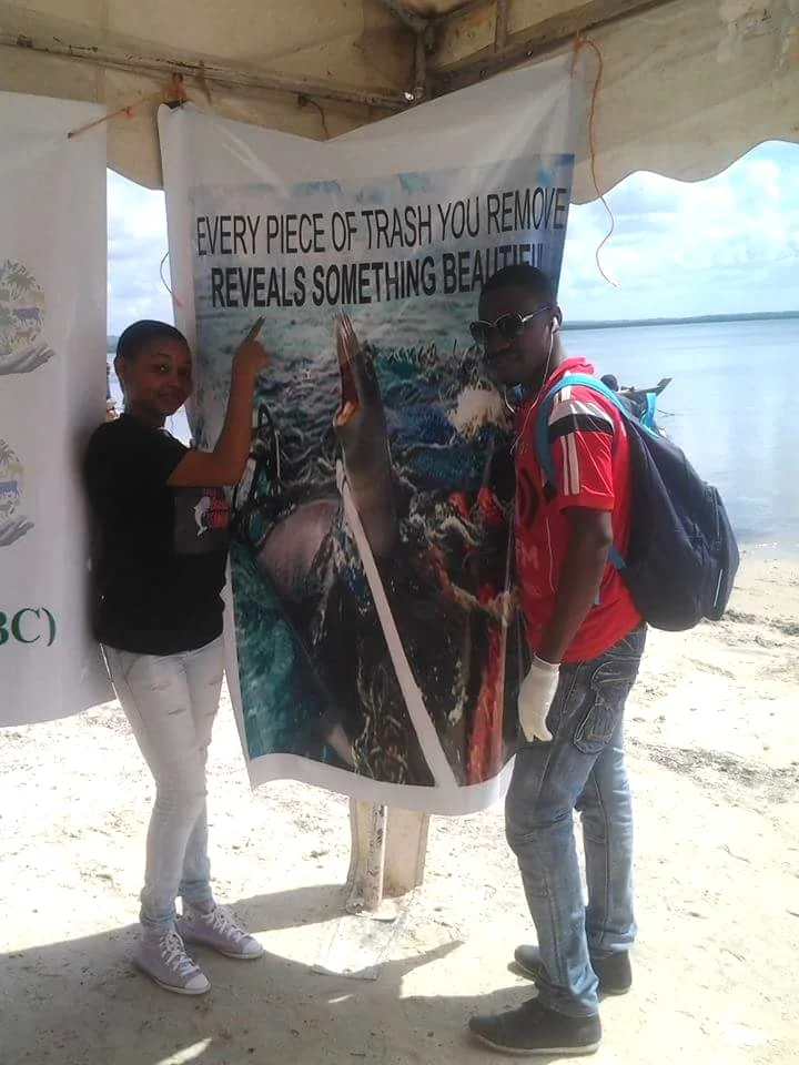 “Every piece of trash you remove reveals something beautiful'“ - local educational signage displayed by Esther and her team.