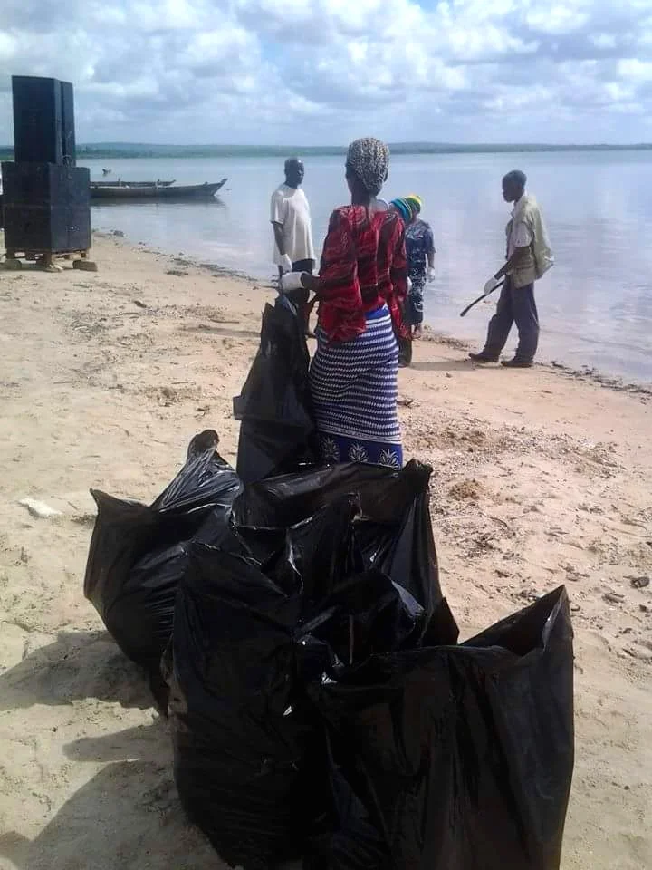Members of the community of Tanga helping during one of LSBC’s beach cleanups.