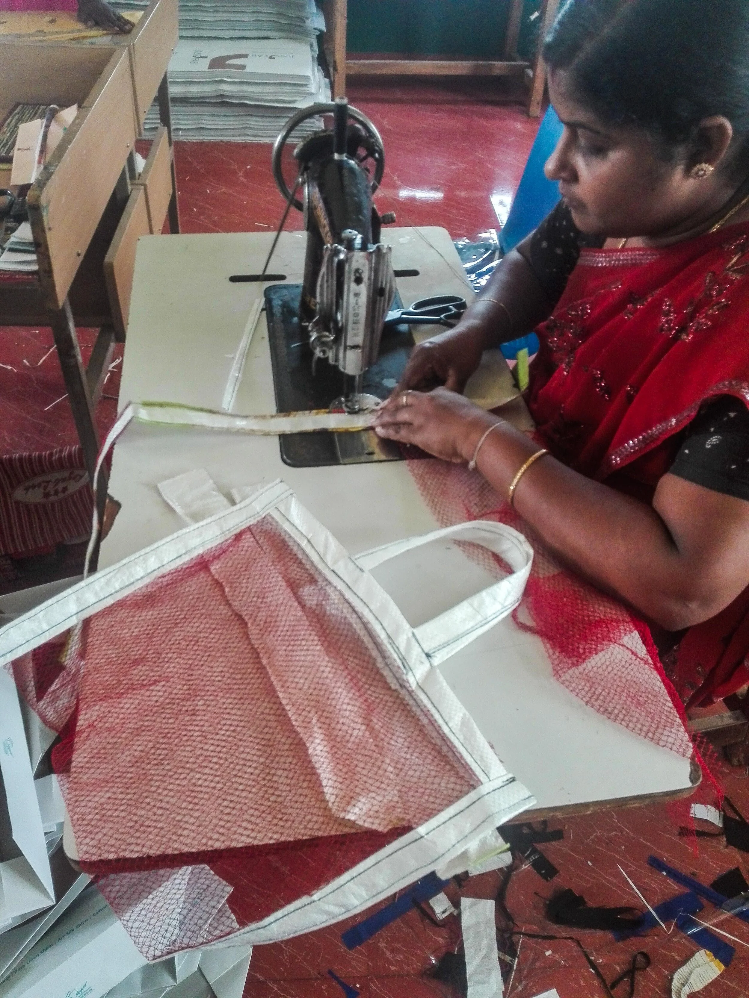 Women from Kottapuram and SISP sewing our single-use plastic bag alternatives from fishing nets that we have collected across the region.