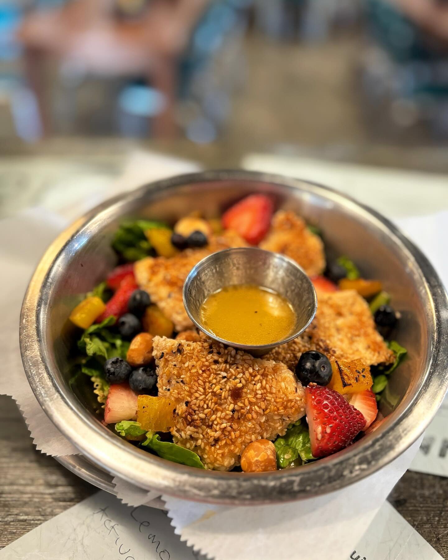 Special of the day : sesame crusted amberjack on a bed of greens with strawberries, blueberries, roasted macadamia nuts, grilled pineapples and tequila lime vinaigrette #warehousebakeryanddonuts #amberjack #fairhope #fairhopealabama #sweethomealabama