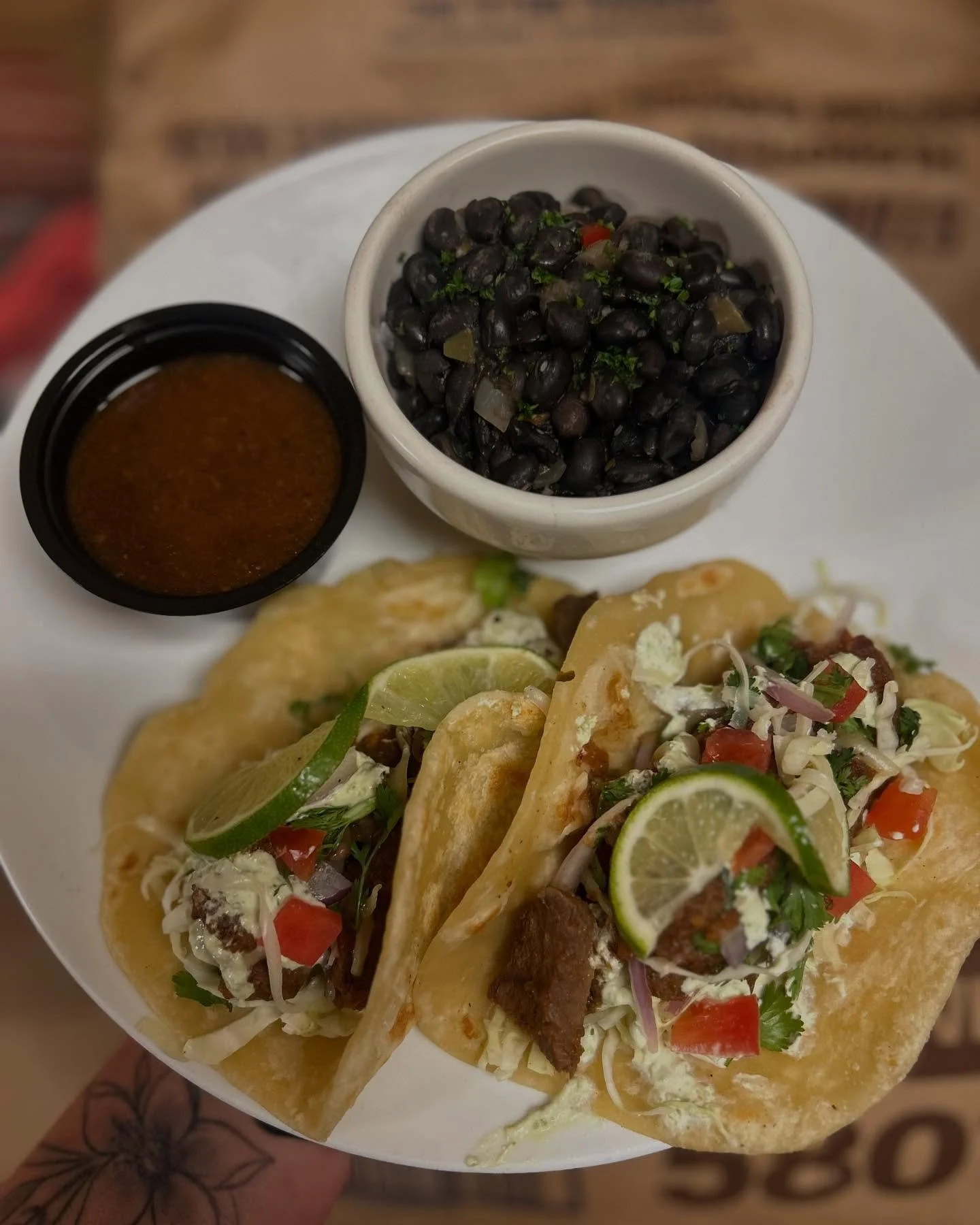 Todays special is Birria style tacos with nature nine grass fed and hormone free beef served on a fresh house made tortilla, shredded cabbage, cheddar cheese, cilantro and diced tomatoes served with a side of birria sauce and your choice of side. #ho