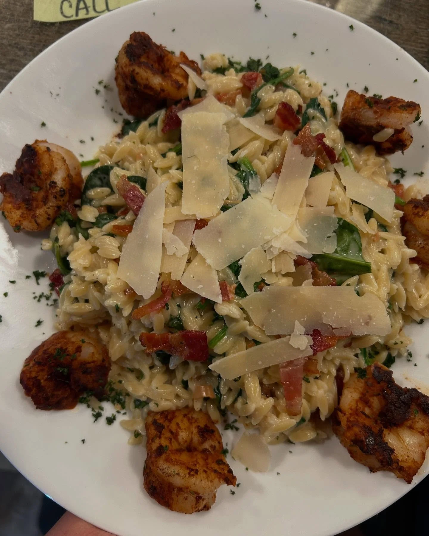 Smoked Gouda and bacon orzo pasta with wilted spinach, blackened shrimp and topped with Parmesan cheese. #special #warehousebakeryanddonuts #fairhopealabama #localshrimp