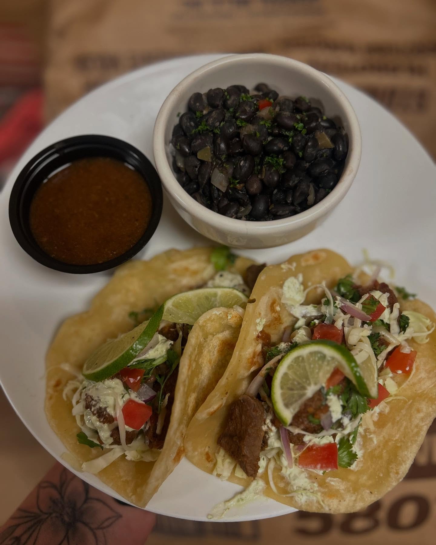 Todays special is Birria style tacos with nature nine grass fed and hormone free beef served on a fresh house made tortilla, shredded cabbage, cheddar cheese, cilantro and diced tomatoes served with a side of birria sauce and your choice of side. #ho