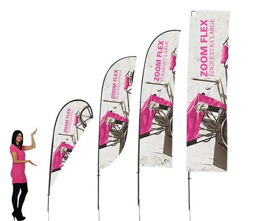 Flex Flags feature a full fiber pole and wind-resistant flag offered in several shapes. For indoor or outdoor use, the flexible design allows the graphic to rotate in the wind. Flex Flags come in your choice of single or double-sided and is offered in four shapes - Feather, Straight, Teardrop and Edge. 