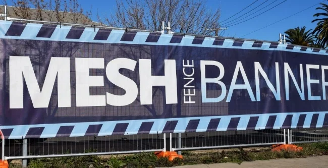 Mesh Banners are digitally printed in full color. Mesh is an outdoor banner material that is used in high wind locations instead of wind slits. Great for fence applications!