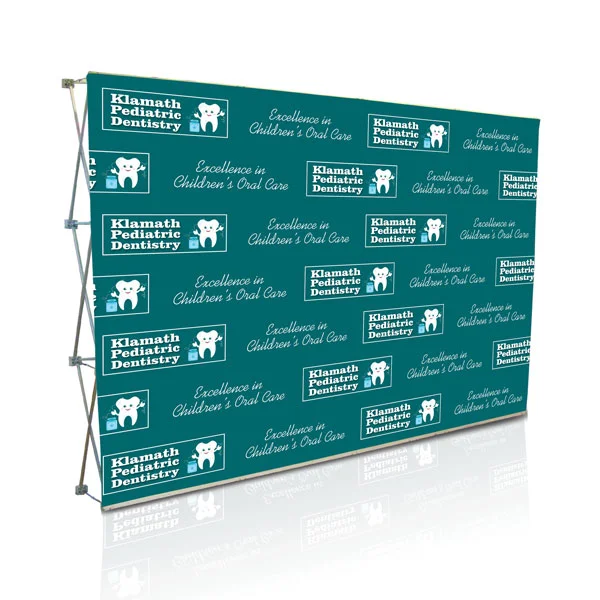 The repeating logo backdrop subtlety reminds us of the company, product or event in every picture we view or video we watch.
