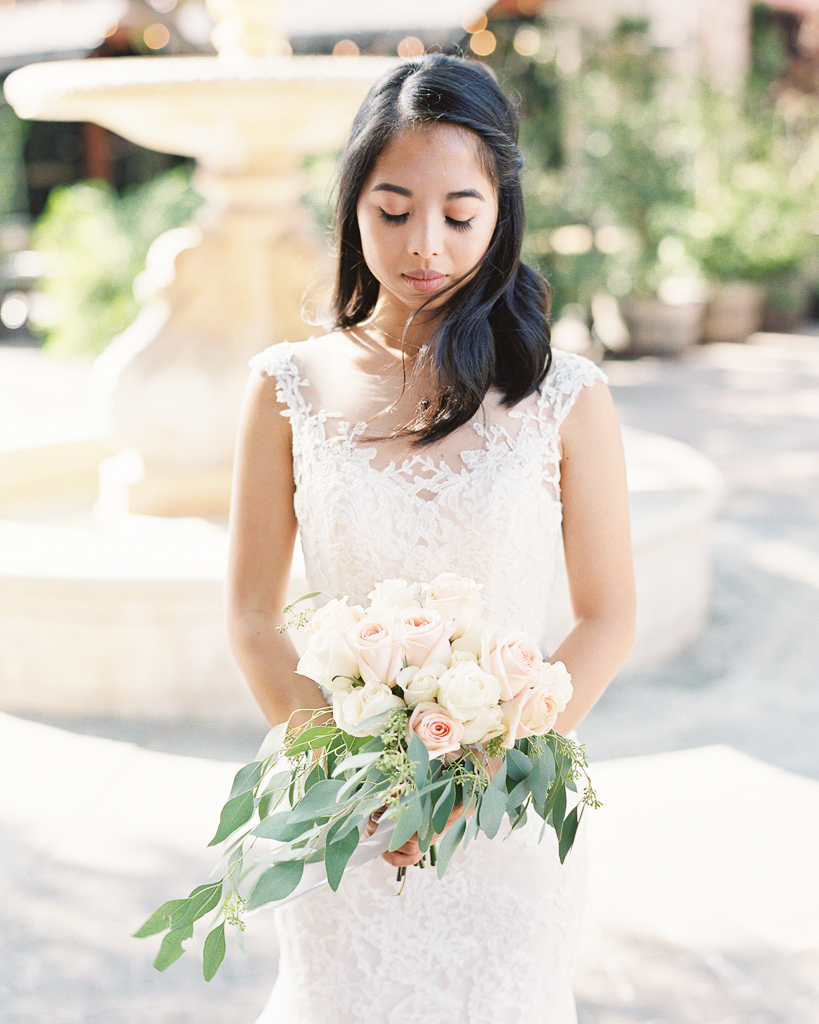 Bride Holding bouquet The Estate on Second Wedding.jpg