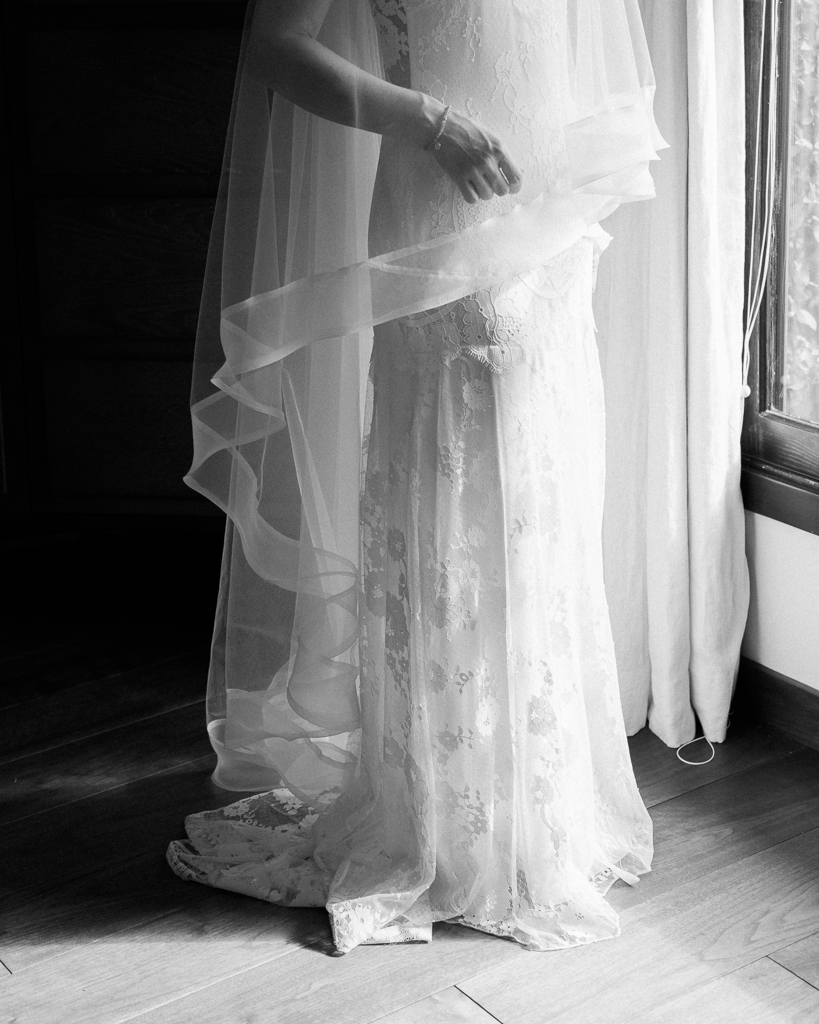 Santa-Barbara-Brides-Dress-Detail-Standing-In-the-Window.jpg