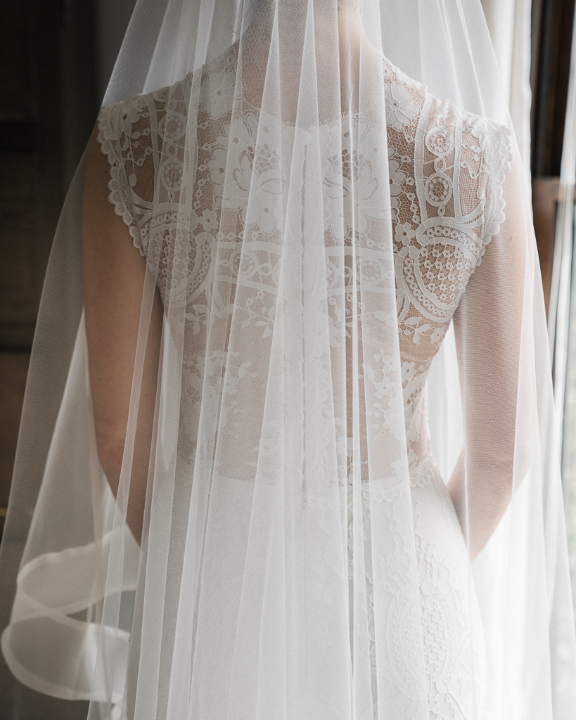 Back-Detail-of-Brides-Dress-in-Santa-Barbara-Luxe-Wedding.jpg