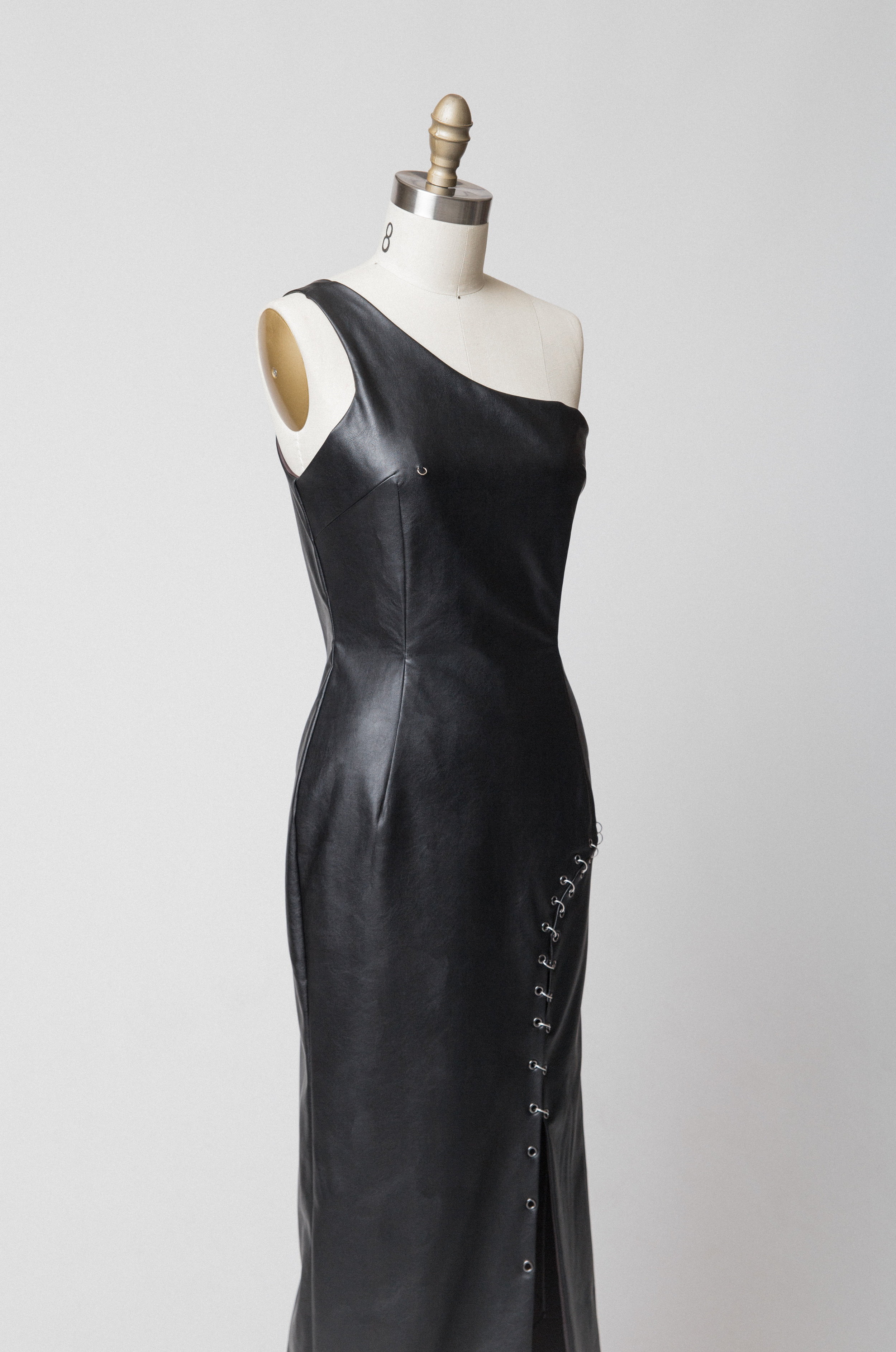 Vegan leather one-shoulder dress. Original KYRA Unfltd design. Photographer: Clinton D. Elliott
