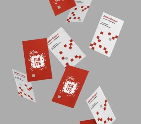  Business cards feature a die-cut pixel to reinforce an employee’s impact. 