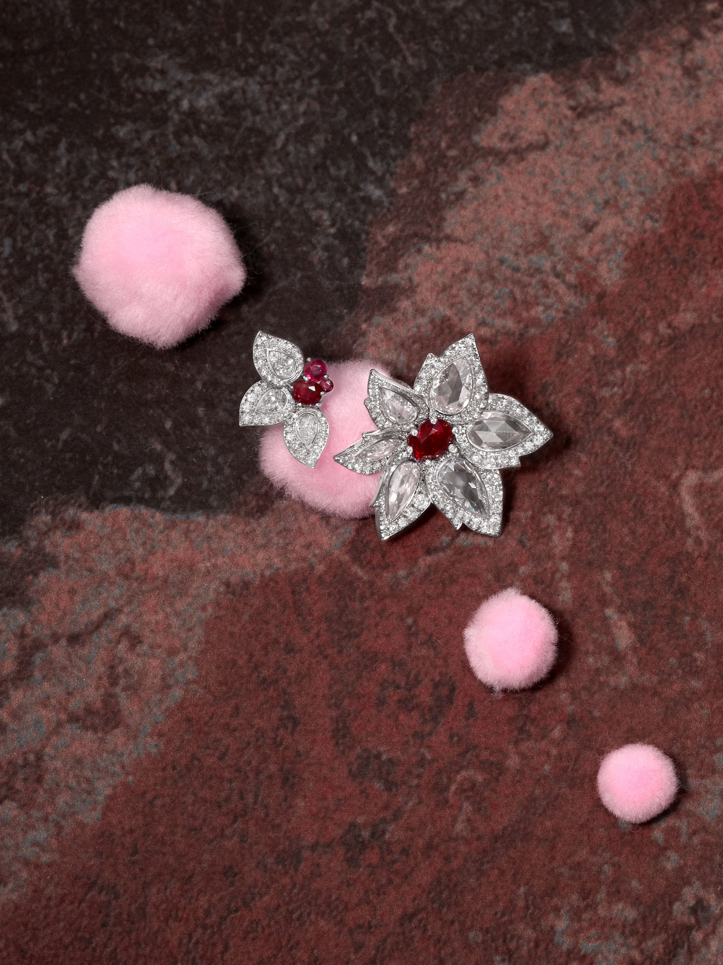 Burma Ruby Palm ring with micro-set white diamondsurrounds set in 18ct white gold.