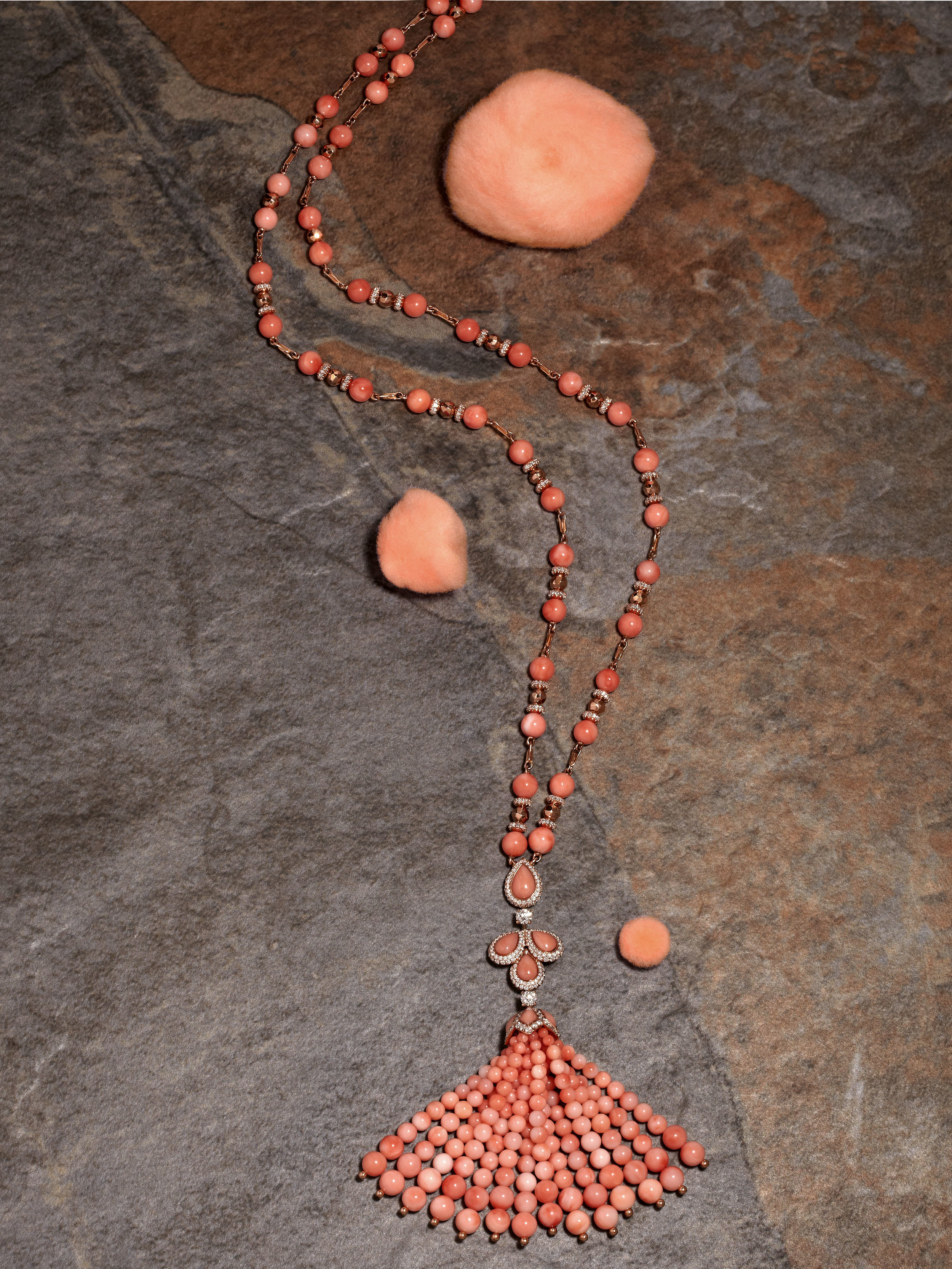 Pink bead Tassel necklace with white diamond micro-set surrounds set in 18ct rose gold