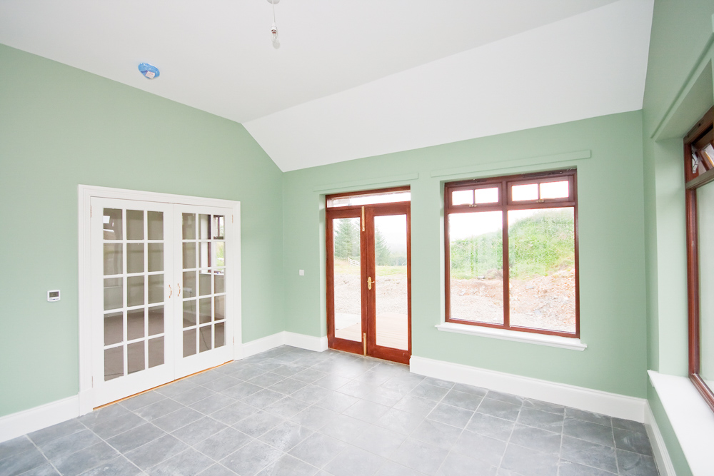 Sunroom complete with underfloor heating. 