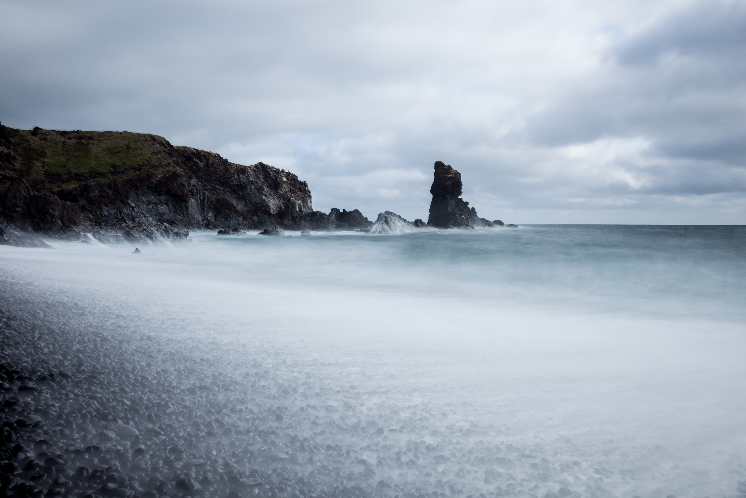 Gossamer waves washing over the pebbles