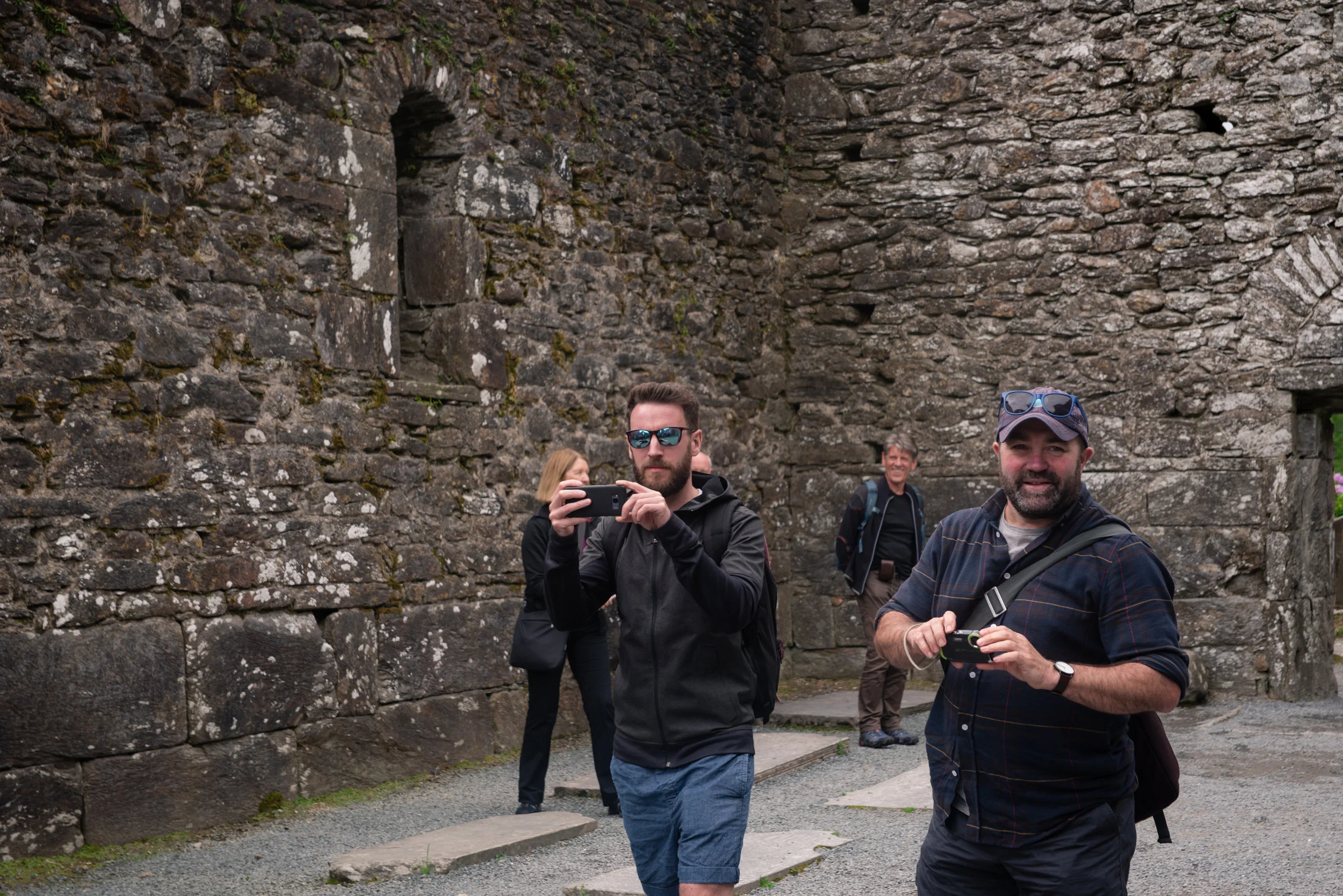 I love taking pictures of people taking pictures of us in a group. Two of our program leaders/ teachers while we are here. 